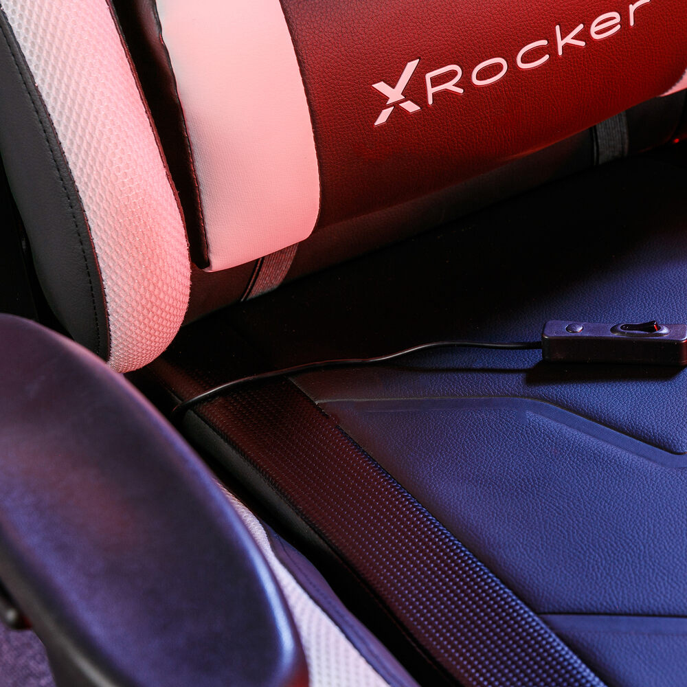 Ein schwarzer Gaming-Stuhl mit rotem X-Rocker-Logo und einem Schalter.