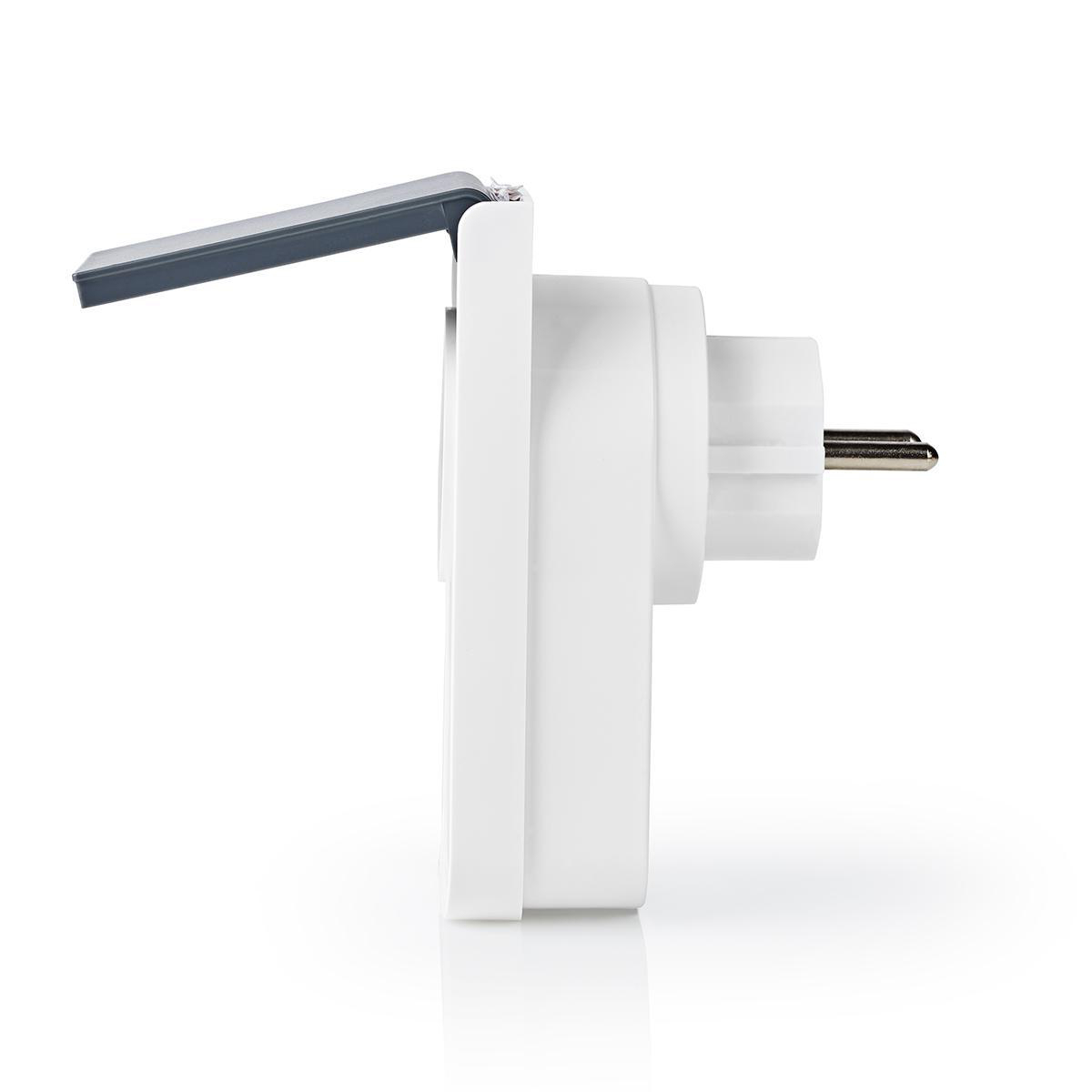 A white travel adapter with its dark gray flap folded up.