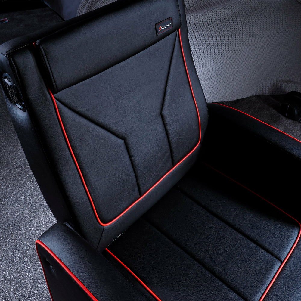 Schwarzer Gaming-Stuhl mit roten Akzenten und dem X-Rocker-Logo.