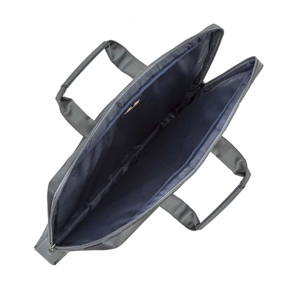 A gray laptop bag with open compartments and handles, viewed from above.