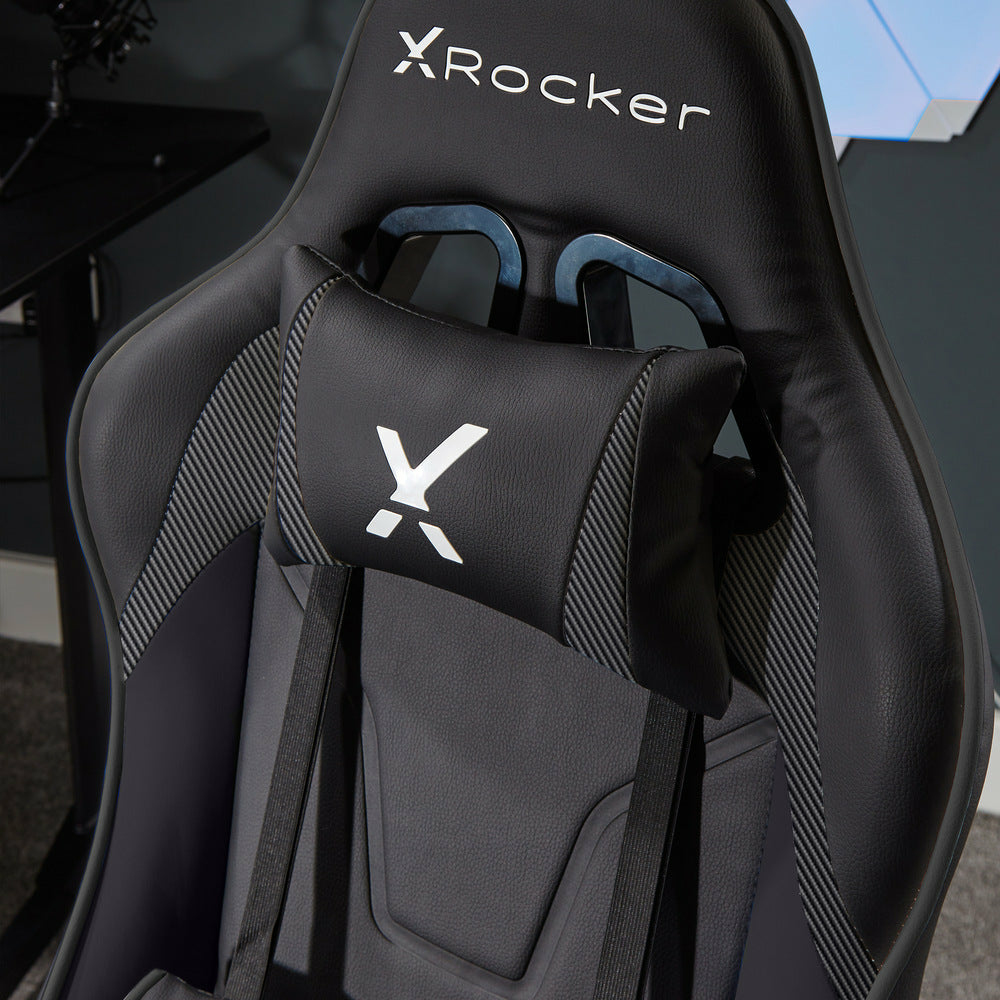Schwarzer X-Rocker Gaming-Stuhl mit weißem Logo und grauen Akzenten. Kopfkissen.