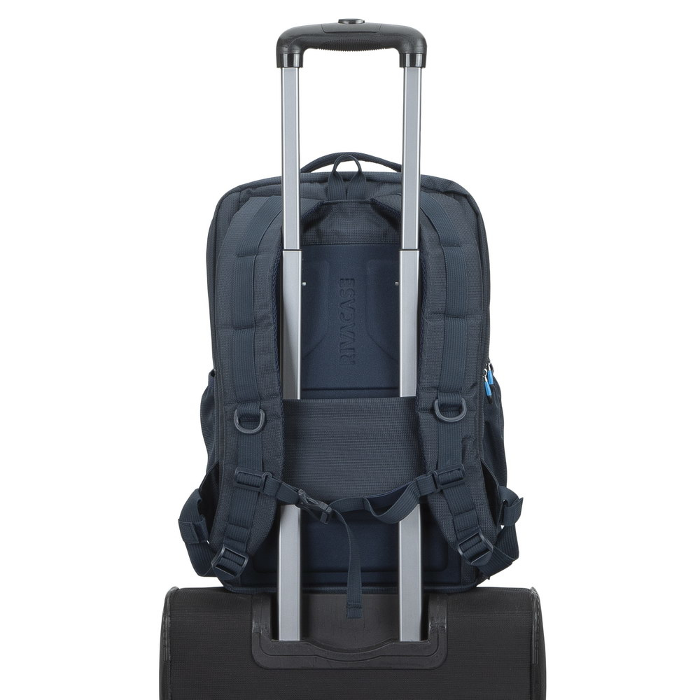 Back view of a dark blue backpack with a telescopic handle and luggage on a white background.