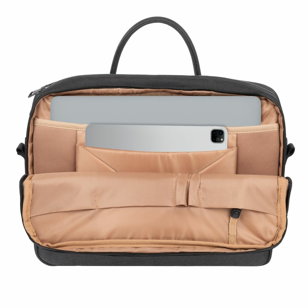 Offene schwarze Laptoptasche mit Laptop und Tablet im Inneren.