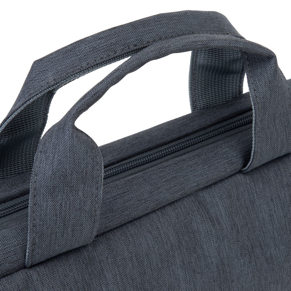 Borsa in tessuto grigio con cerniera e manici.