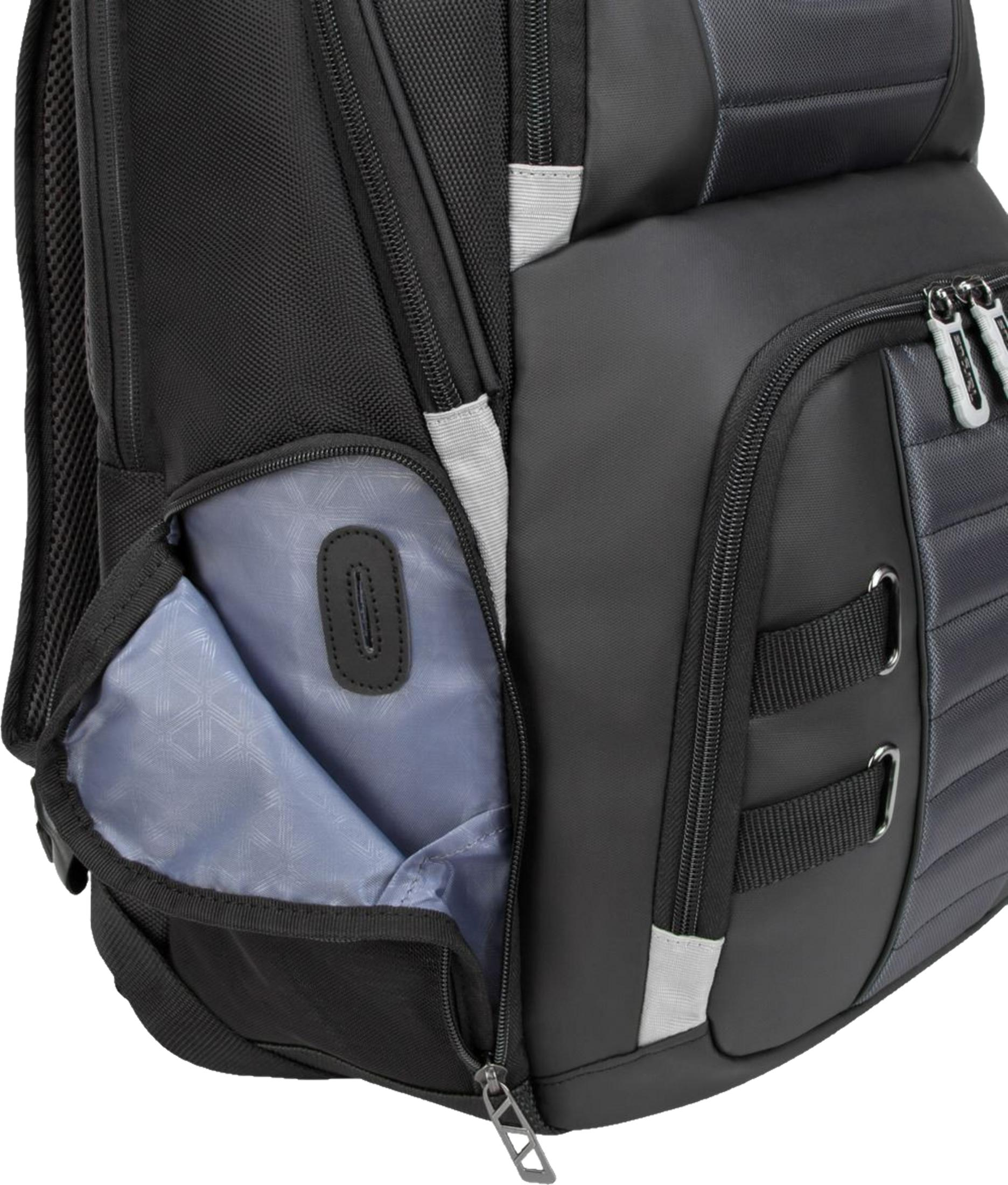 Mochila negra con compartimento abierto y forro azul. Detalles de tela gris.