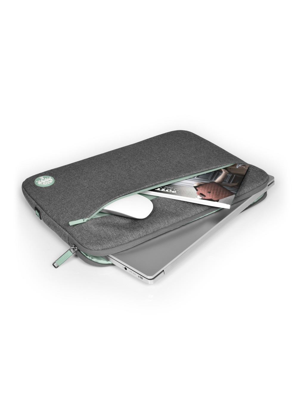 Custodia grigia per laptop con zip verde menta, laptop, mouse e rivista.