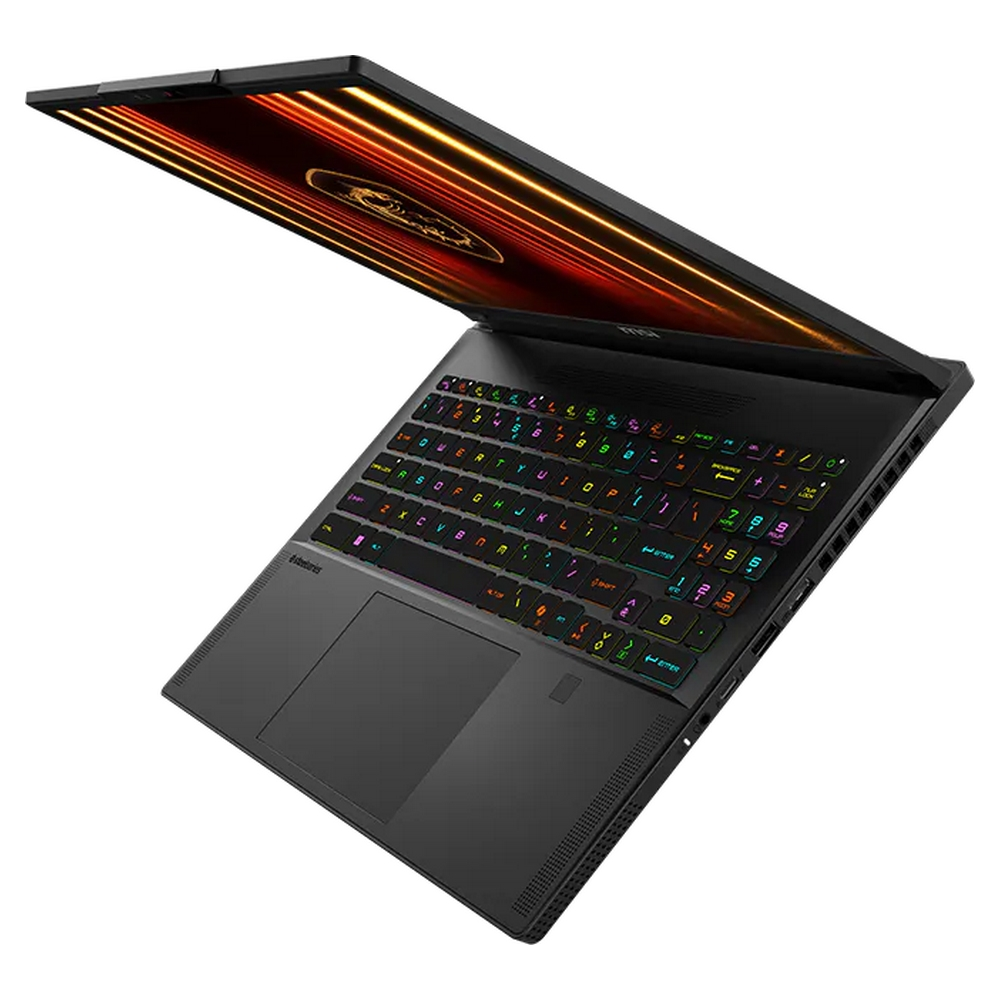 Un laptop nero aperto con tastiera retroilluminata su sfondo bianco.