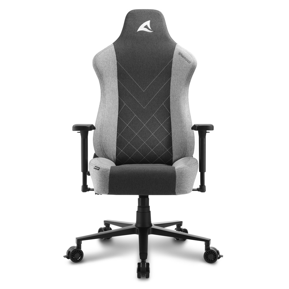 Een grijze gamestoel met armleuningen en een sterrenpatroon op de rug.