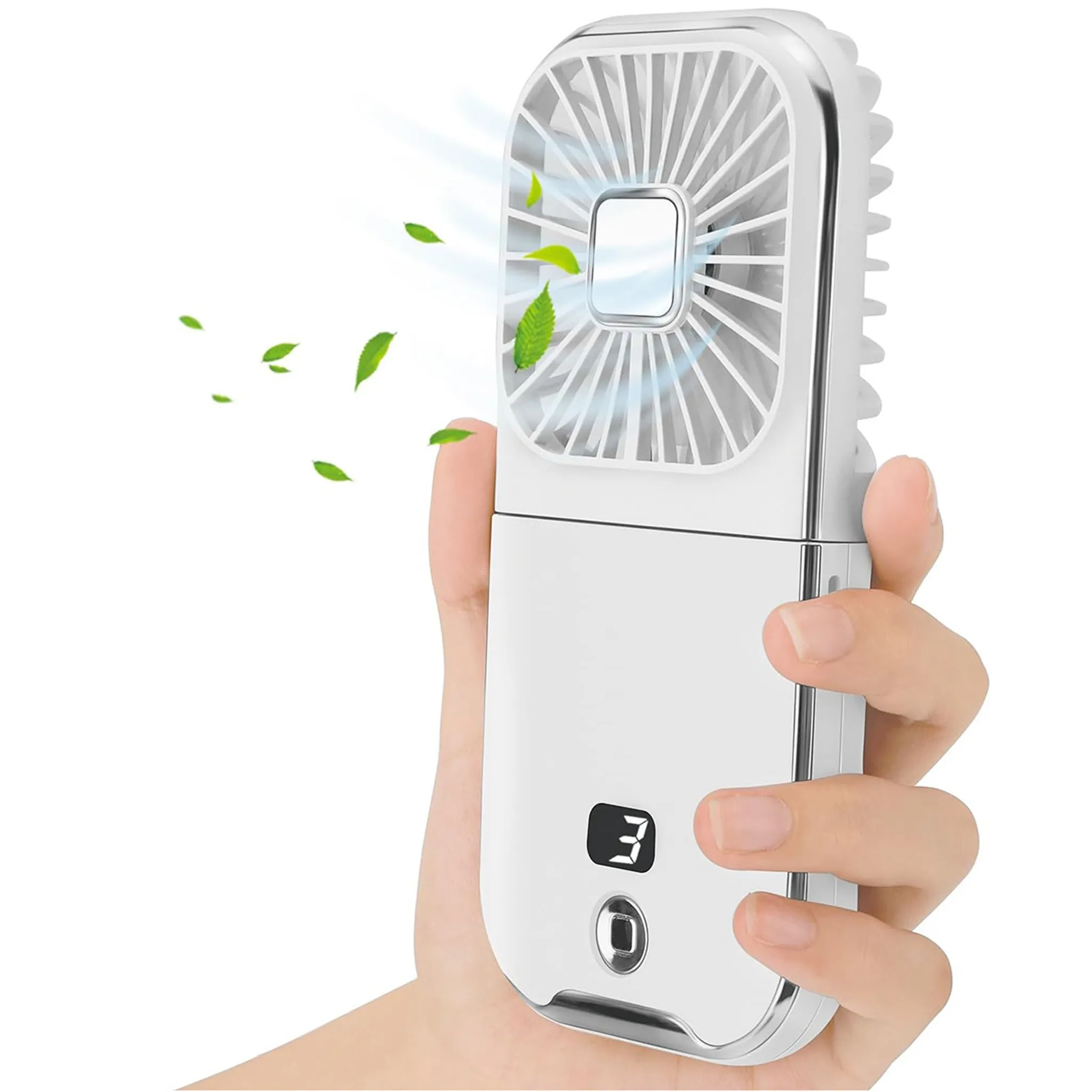 Eine Hand hält einen weißen Handventilator mit Blättern, die vom Wind davongetragen werden.