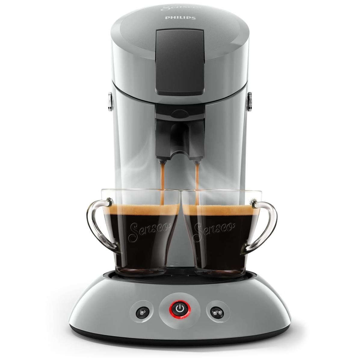 Een grijze Philips Senseo koffiezetapparaat brouwt koffie in twee glazen kopjes.