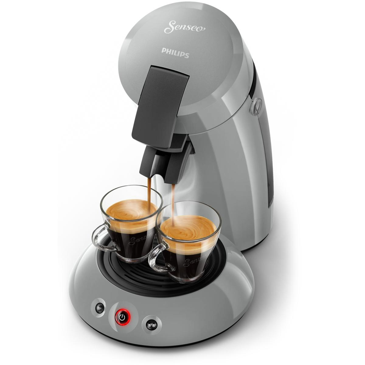 Grijze koffiemachine zet twee kopjes espresso. Senseo logo bovenaan.