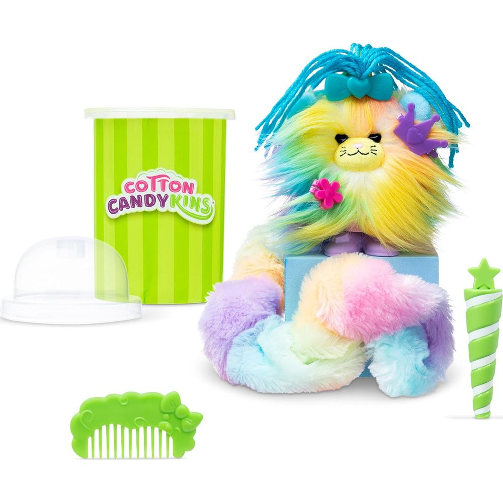 Un peluche arcobaleno con capelli blu accanto a un contenitore verde.