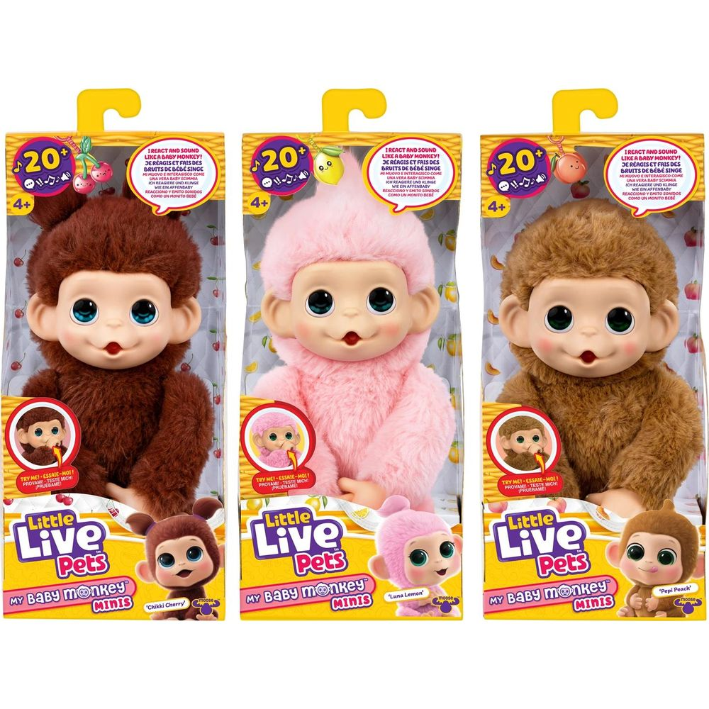 Tres juguetes de bebé mono en empaque: marrón, rosa y marrón.