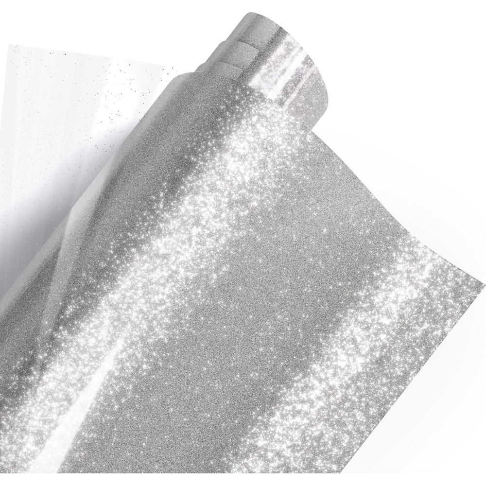 Silbernes Glitzerpapier, das sich aufrollt, mit Lichtreflexionen.