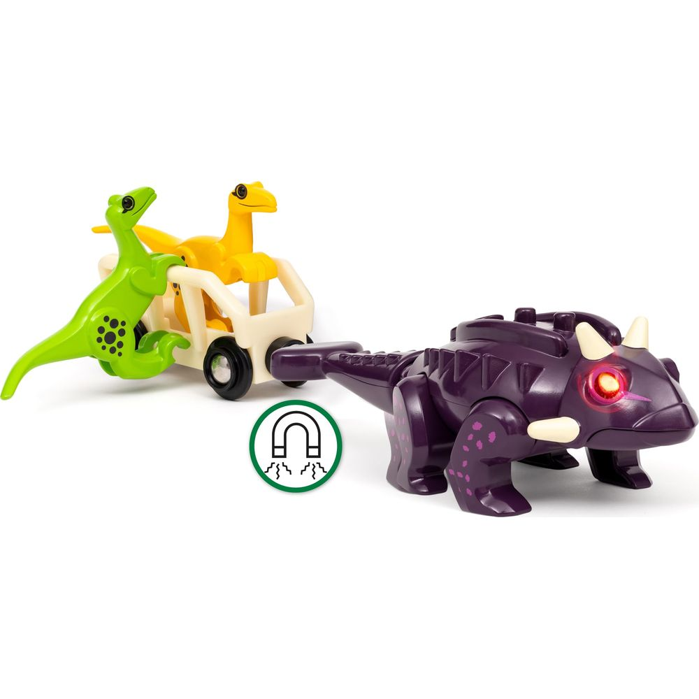 Lila Dinosaurier-Spielzeug mit leuchtenden Augen zieht einen Wagen mit grünen und gelben Dinosauriern.
