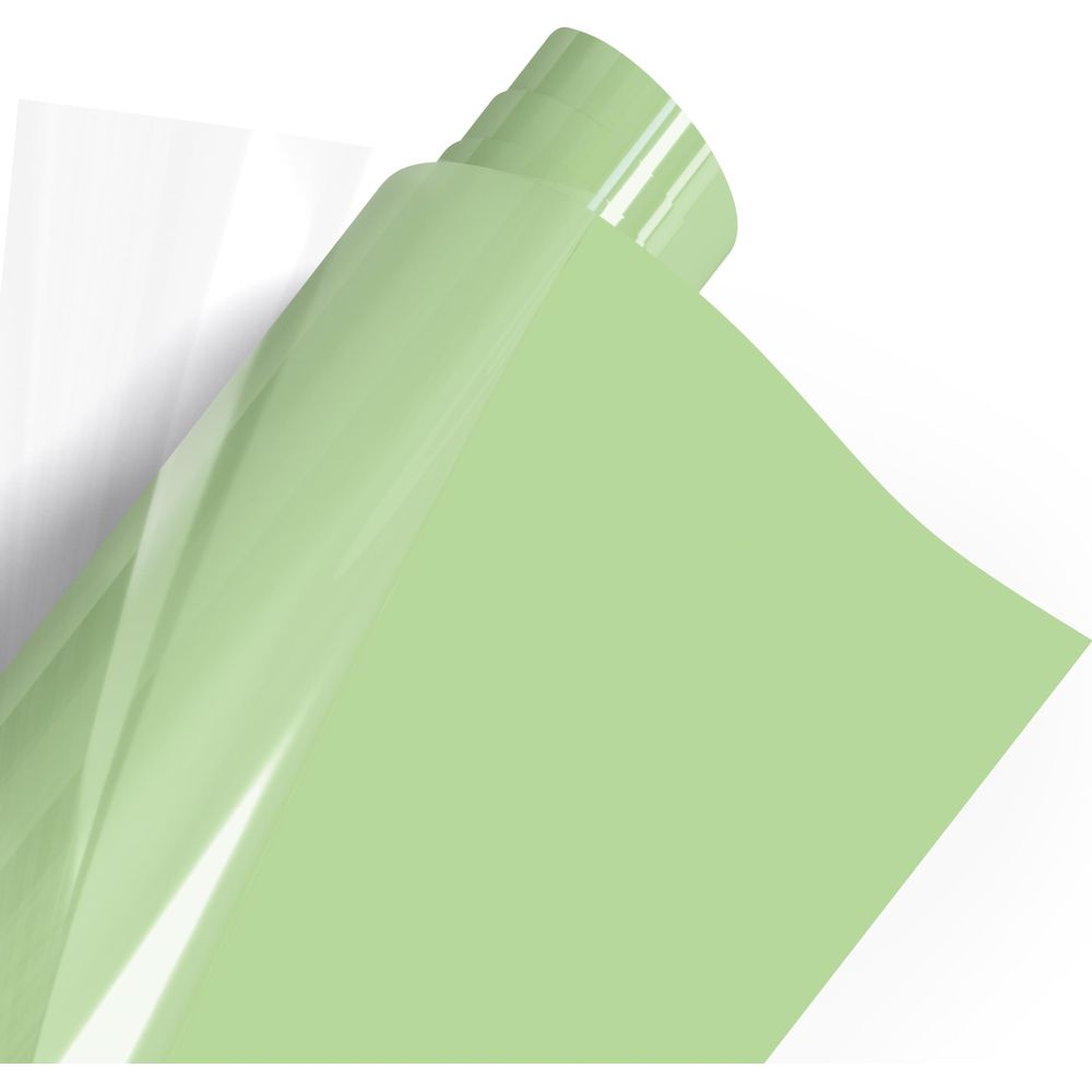 Eine hellgrüne Rolle aus glänzendem Material, teilweise abgerollt.