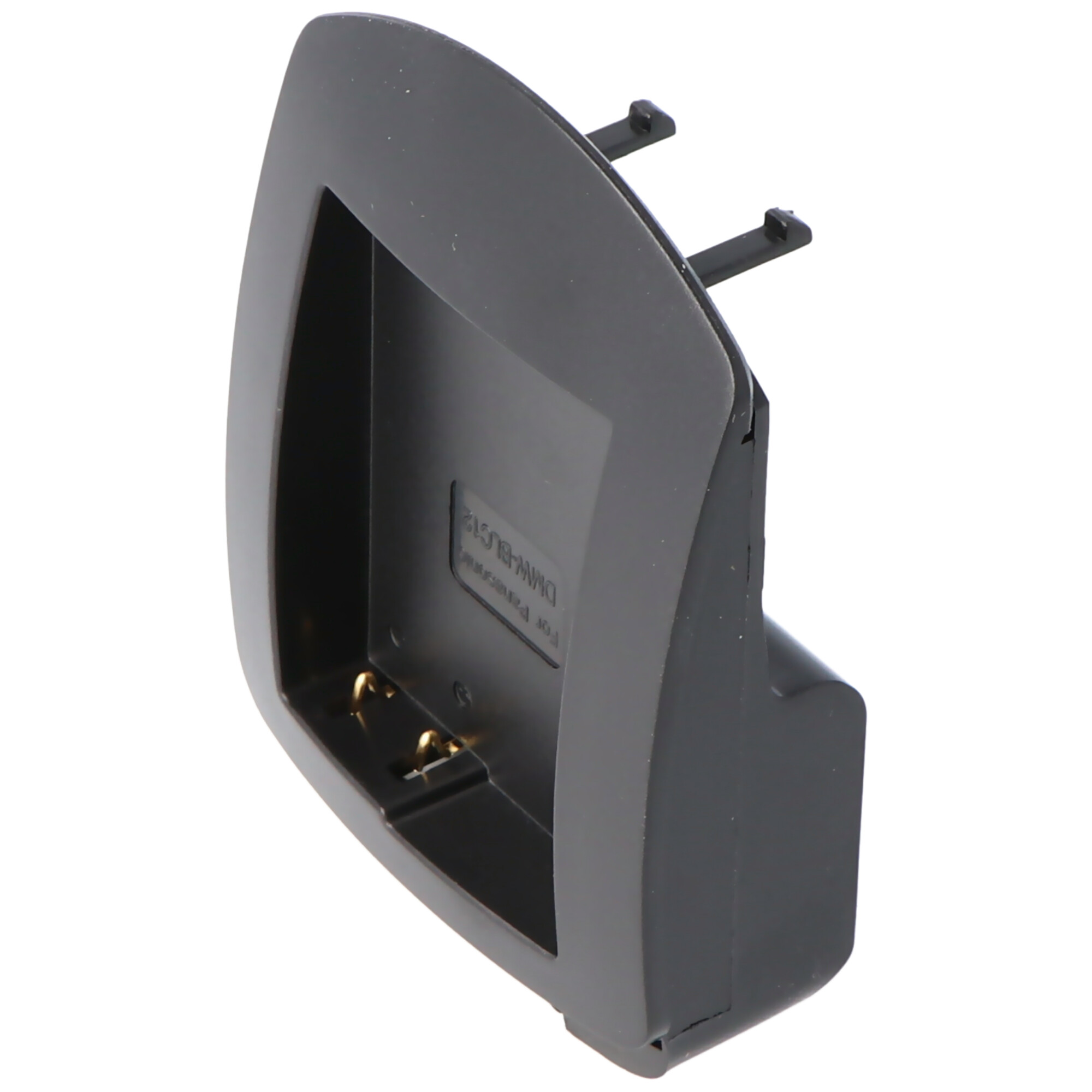 Ein schwarzer Batterieadapter mit goldenen Kontakten und zwei Stiften.