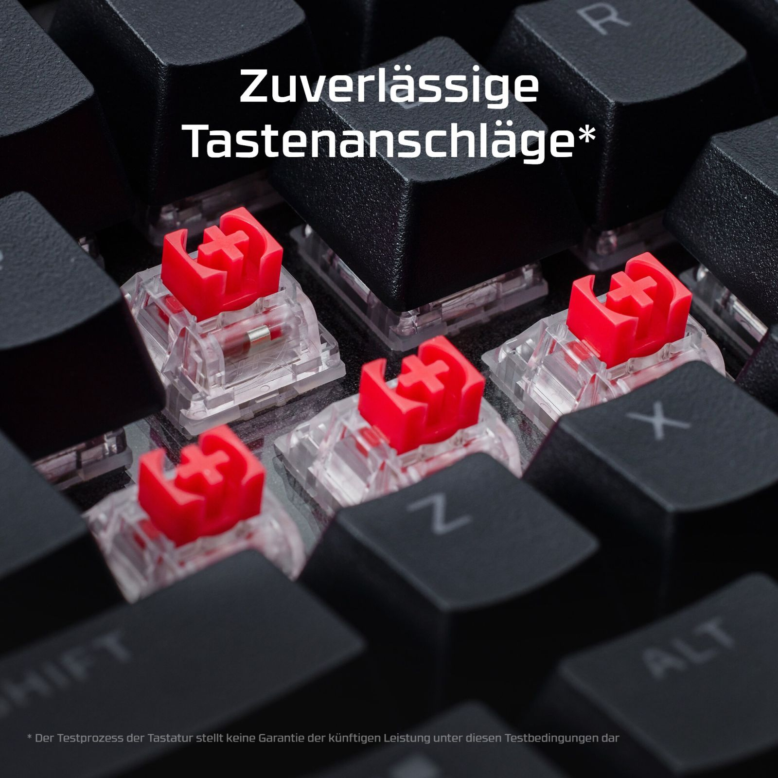 Nahaufnahme von roten mechanischen Tastenschaltern mit schwarzen Tastenkappen auf einer Tastatur.