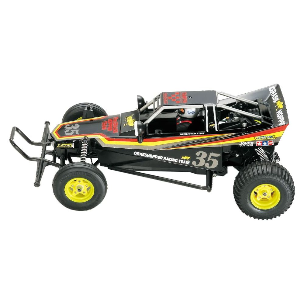 Ein schwarzes RC-Buggy-Modell mit gelben Felgen und Nummer 35.