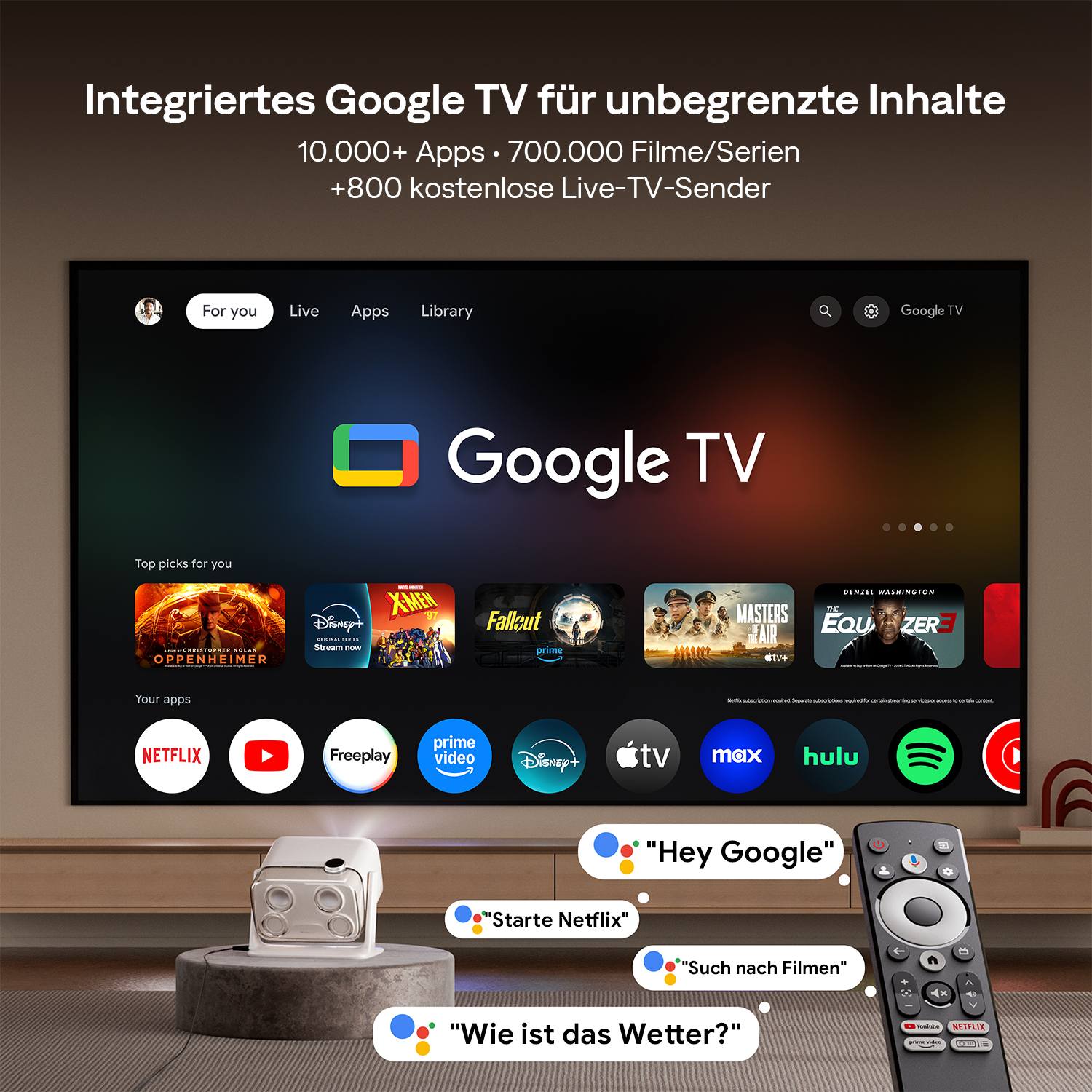 Google TV mit Fernbedienung und Projektor, zeigt Apps und Filme an.