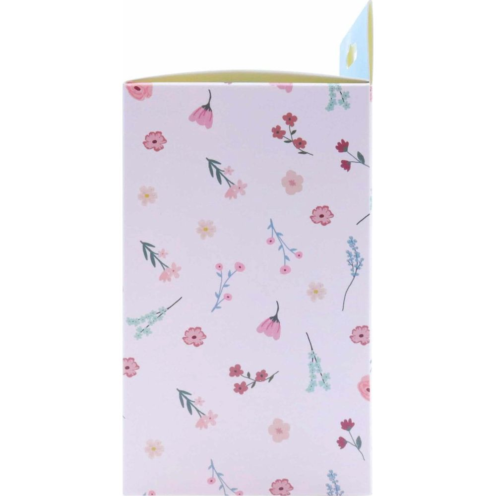Eine weiße Box mit einem rosa Blumendruck. Die Box ist teilweise geöffnet.