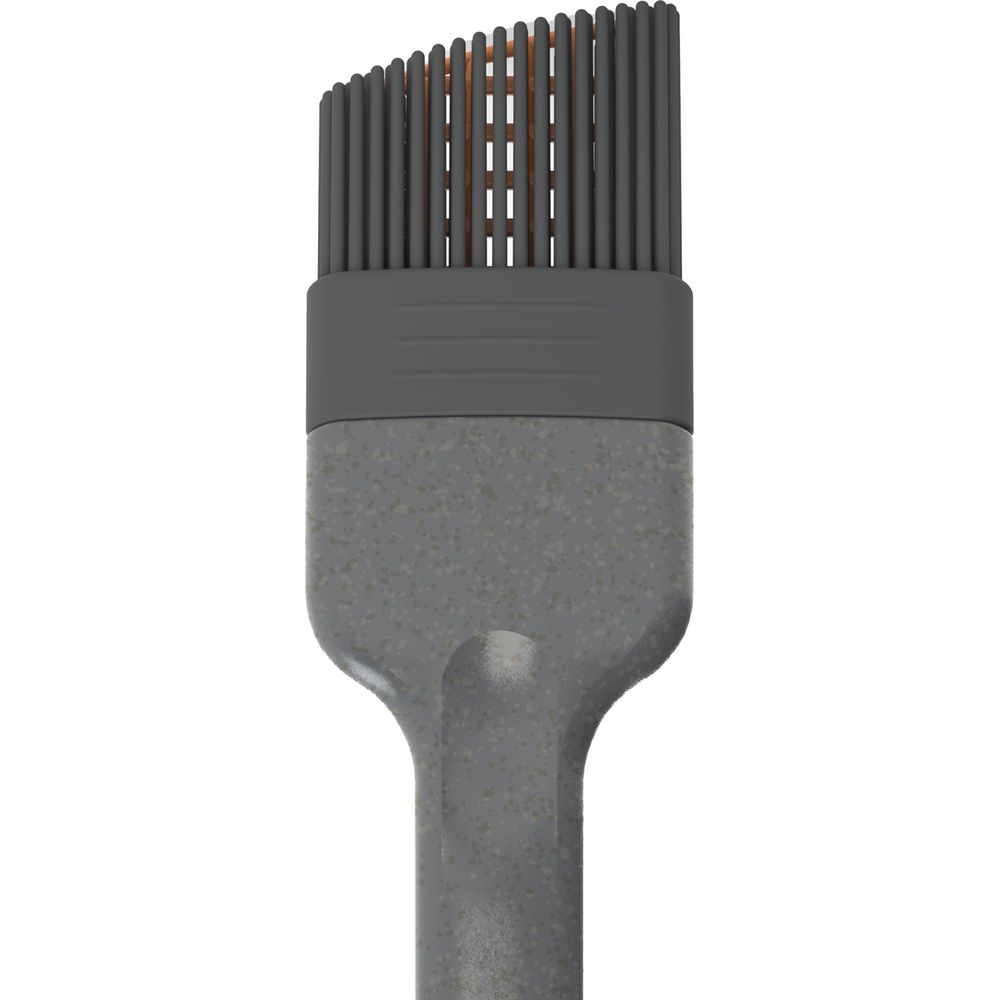 Un pennello in silicone grigio con manico testurizzato e testina larga.