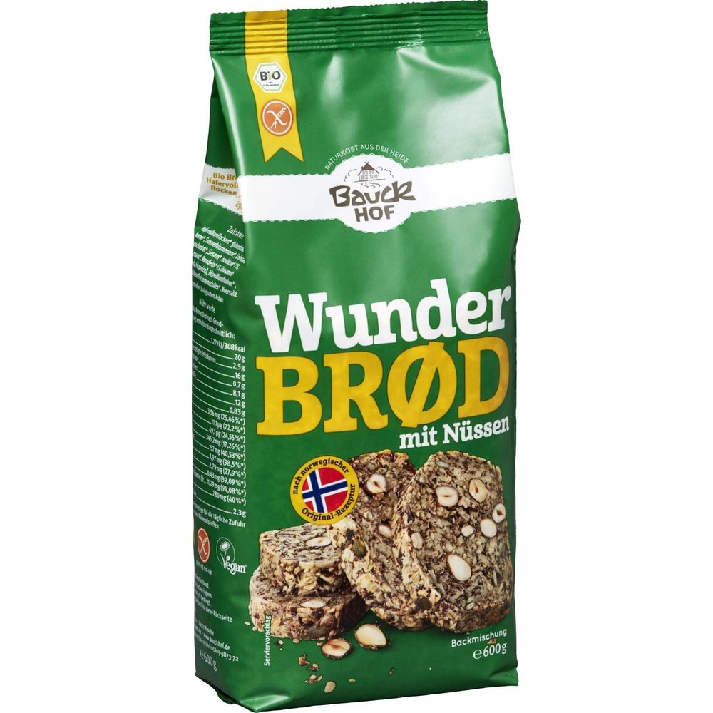 Grüne Packung Bauck HOF 'Wunder BRØD mit Nüssen' Backmischung mit Brotscheiben.