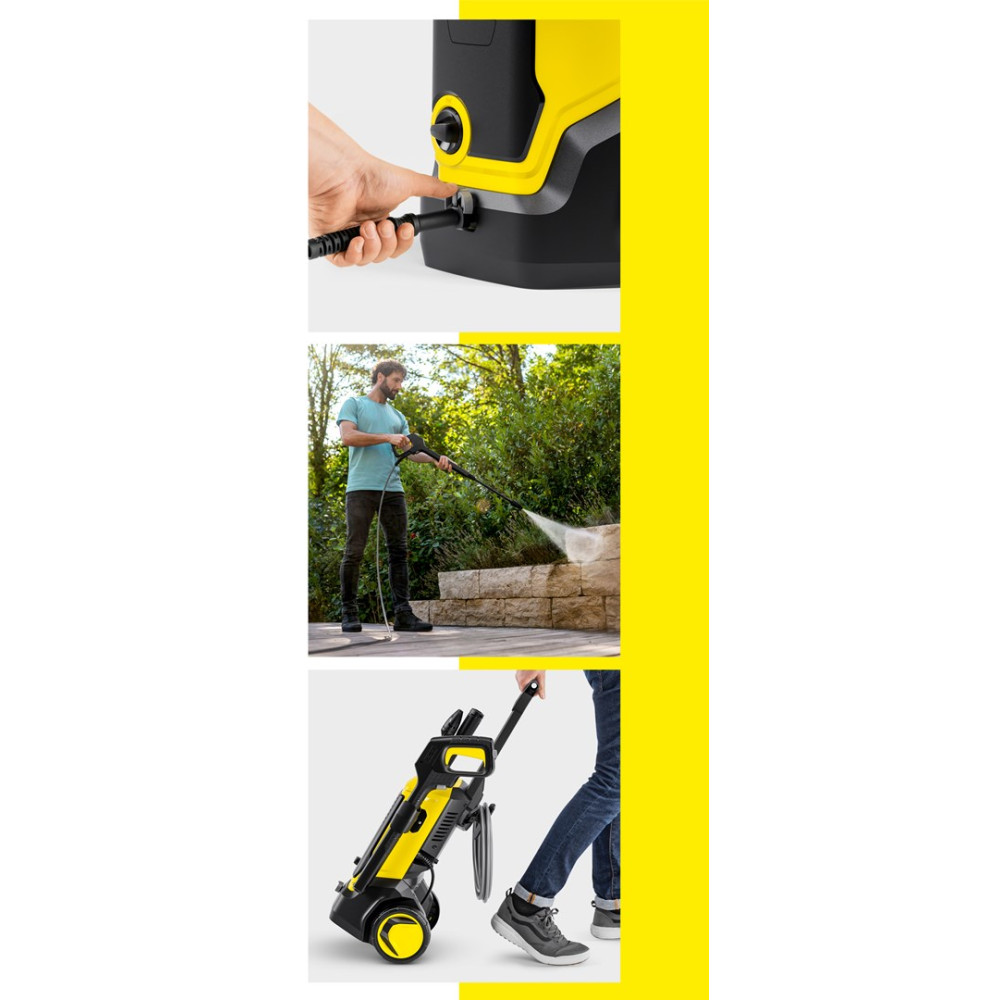 Mężczyzna używa myjki ciśnieniowej do czyszczenia kamieni.