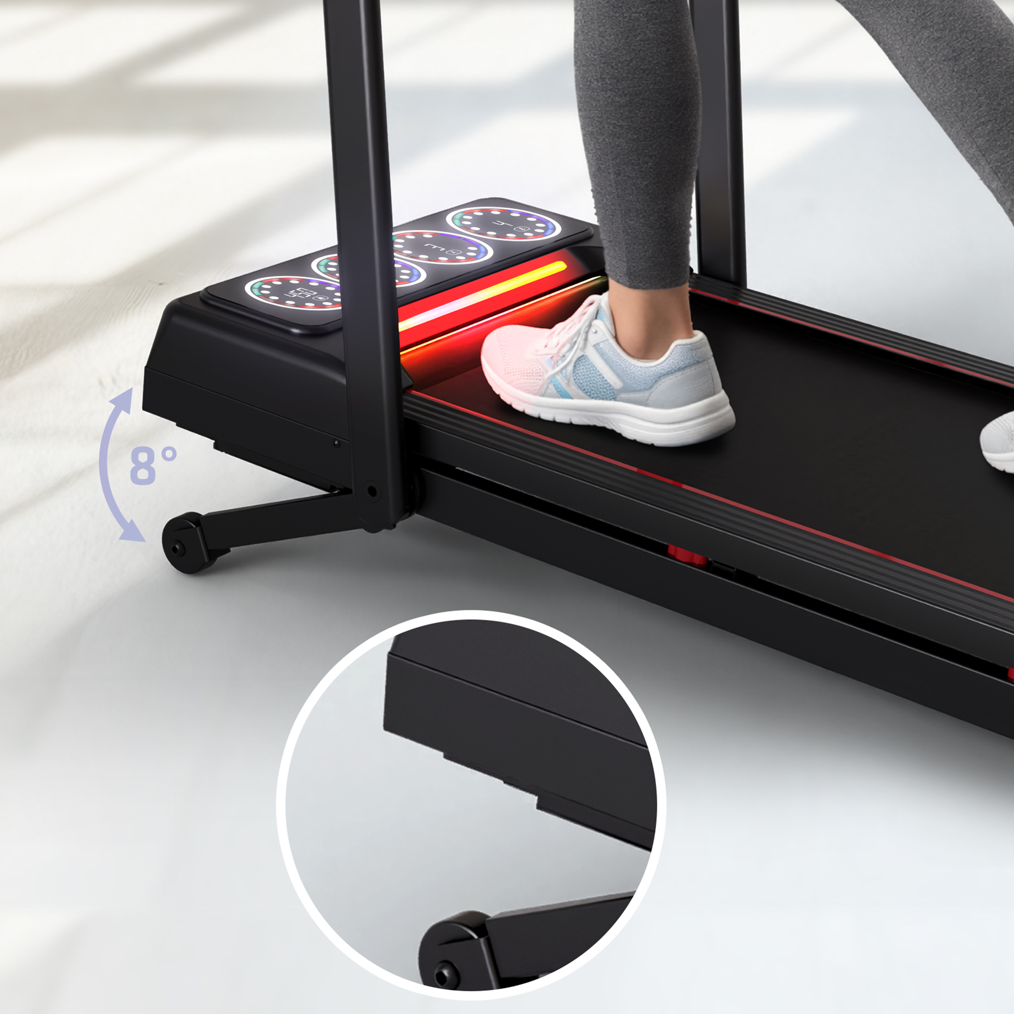 Zbliżenie bieżni z biegnącą osobą. Pokazuje wskaźnik nachylenia 8 stopni.
