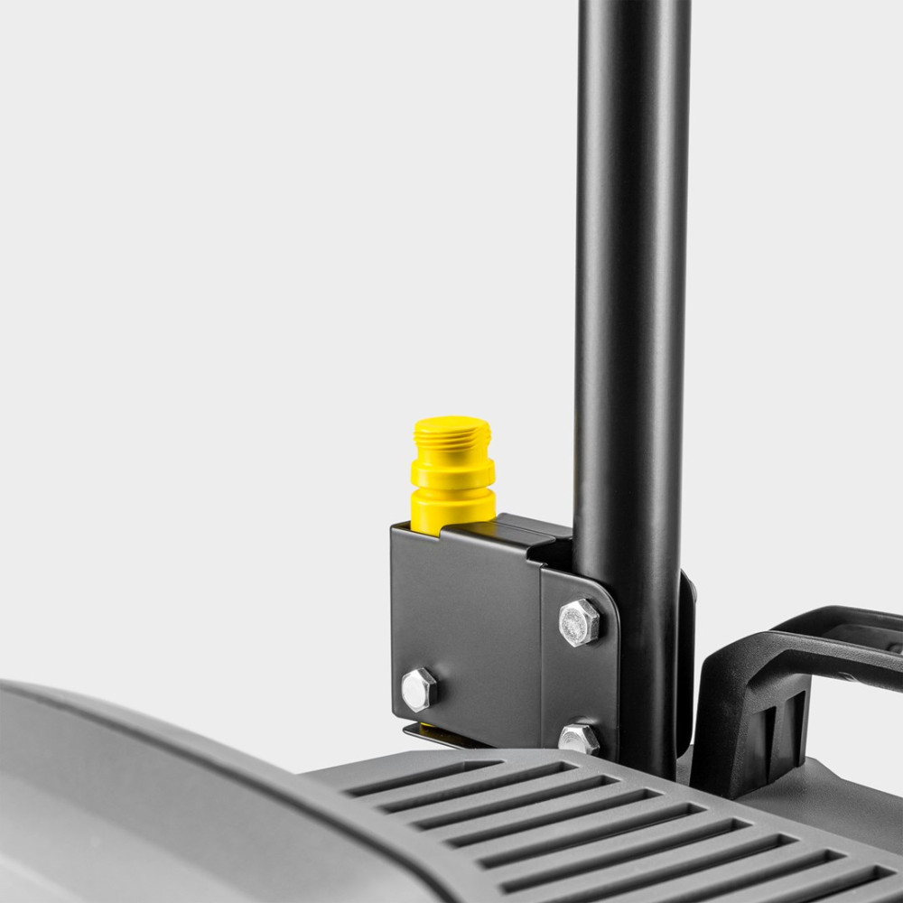 Żółta nakrętka jest przymocowana do czarnego wspornika na czarnym słupku.