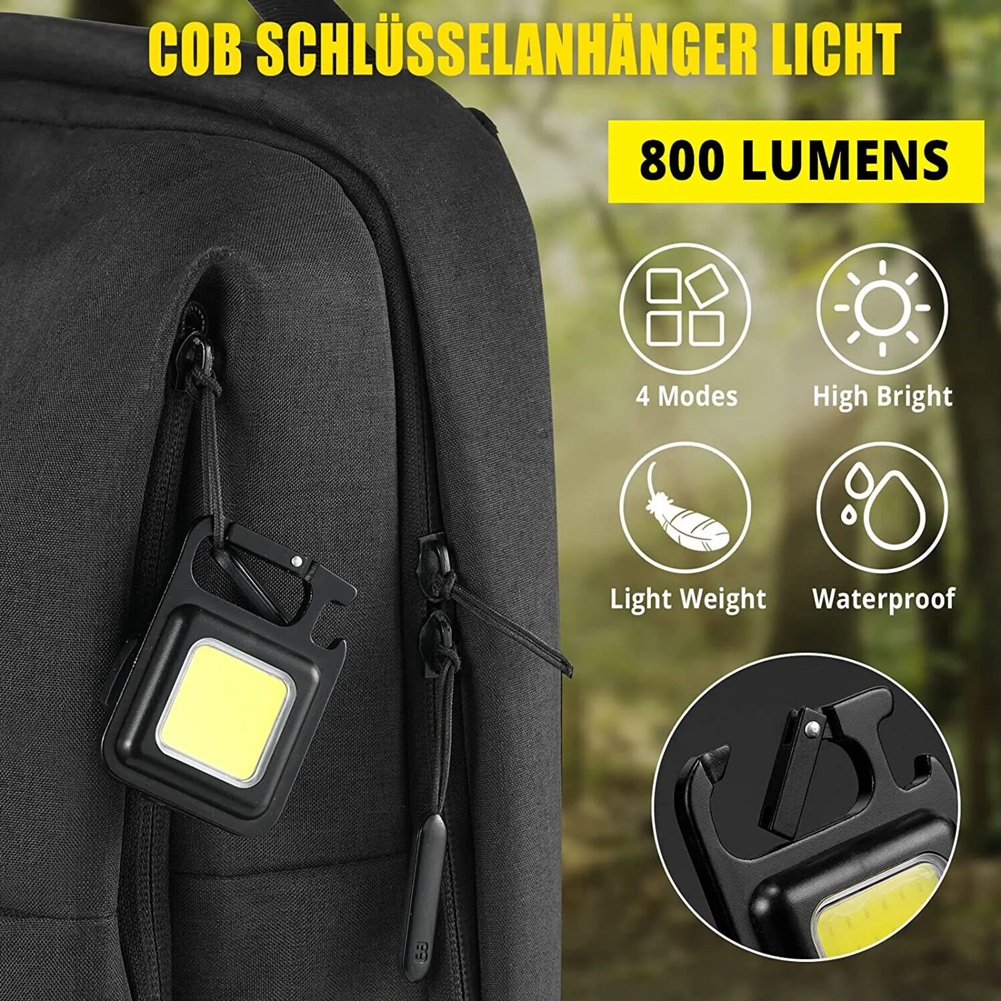 Kompakte schwarze Lampe mit Schlüsselanhänger an Rucksack. 800 Lumen.