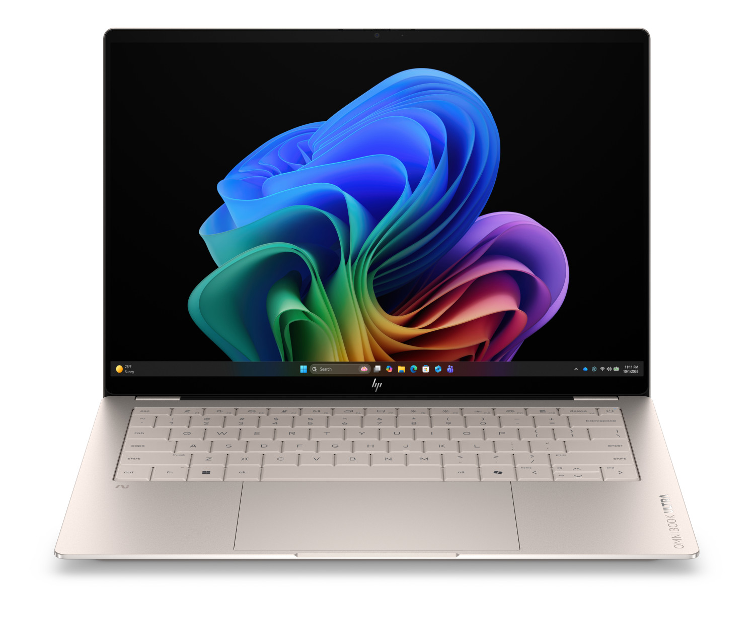 Un laptop beige chiaro con sfondo colorato e tastiera.