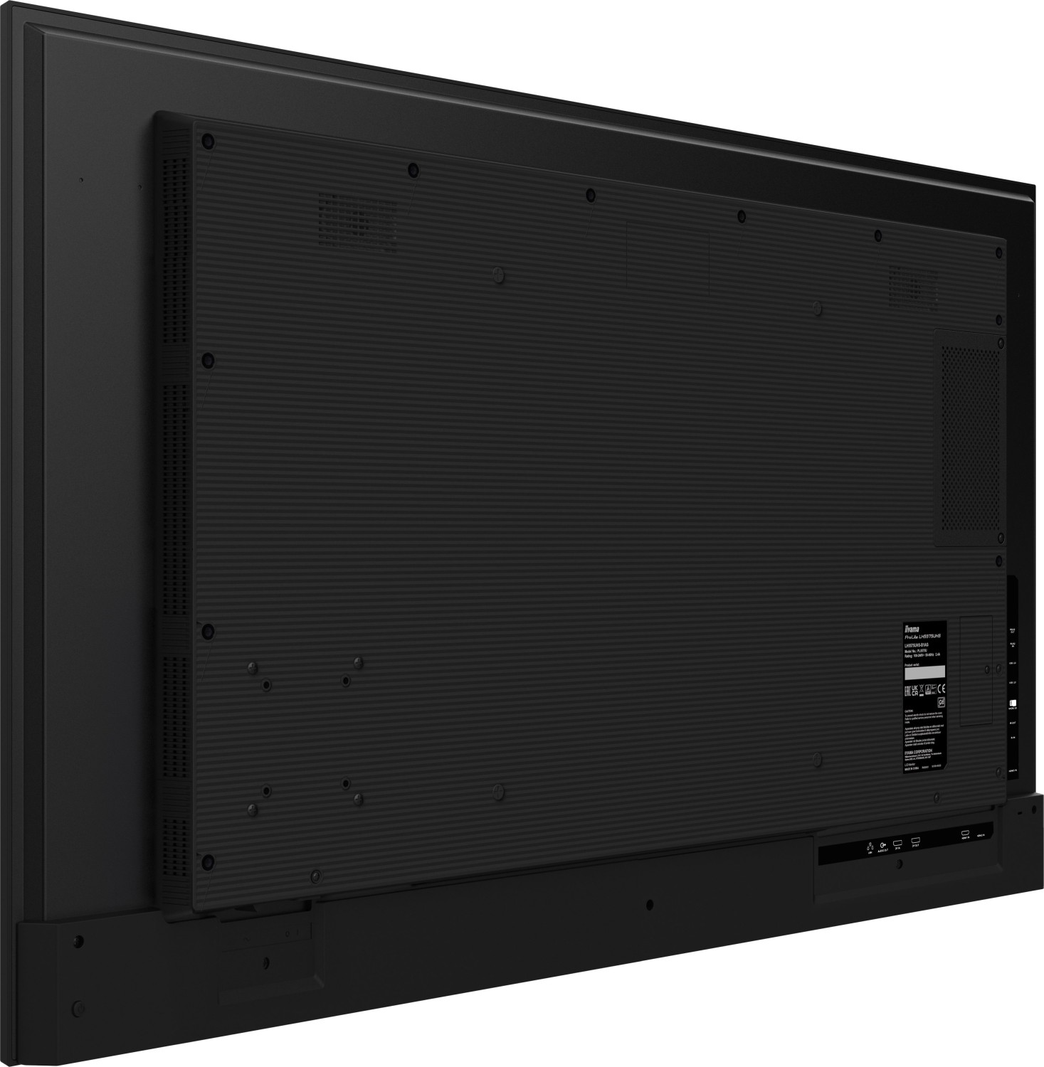 Vista trasera de un televisor negro con rejillas y puertos.