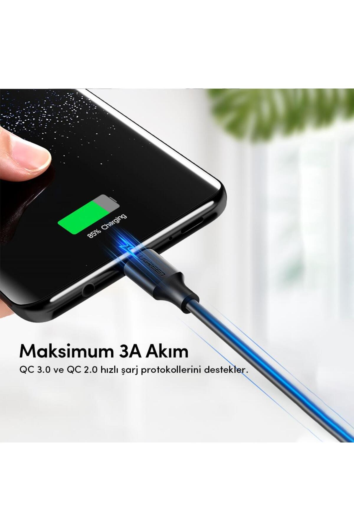 Bir telefon %85 şarj oluyor, USB-C kablosu bağlı.