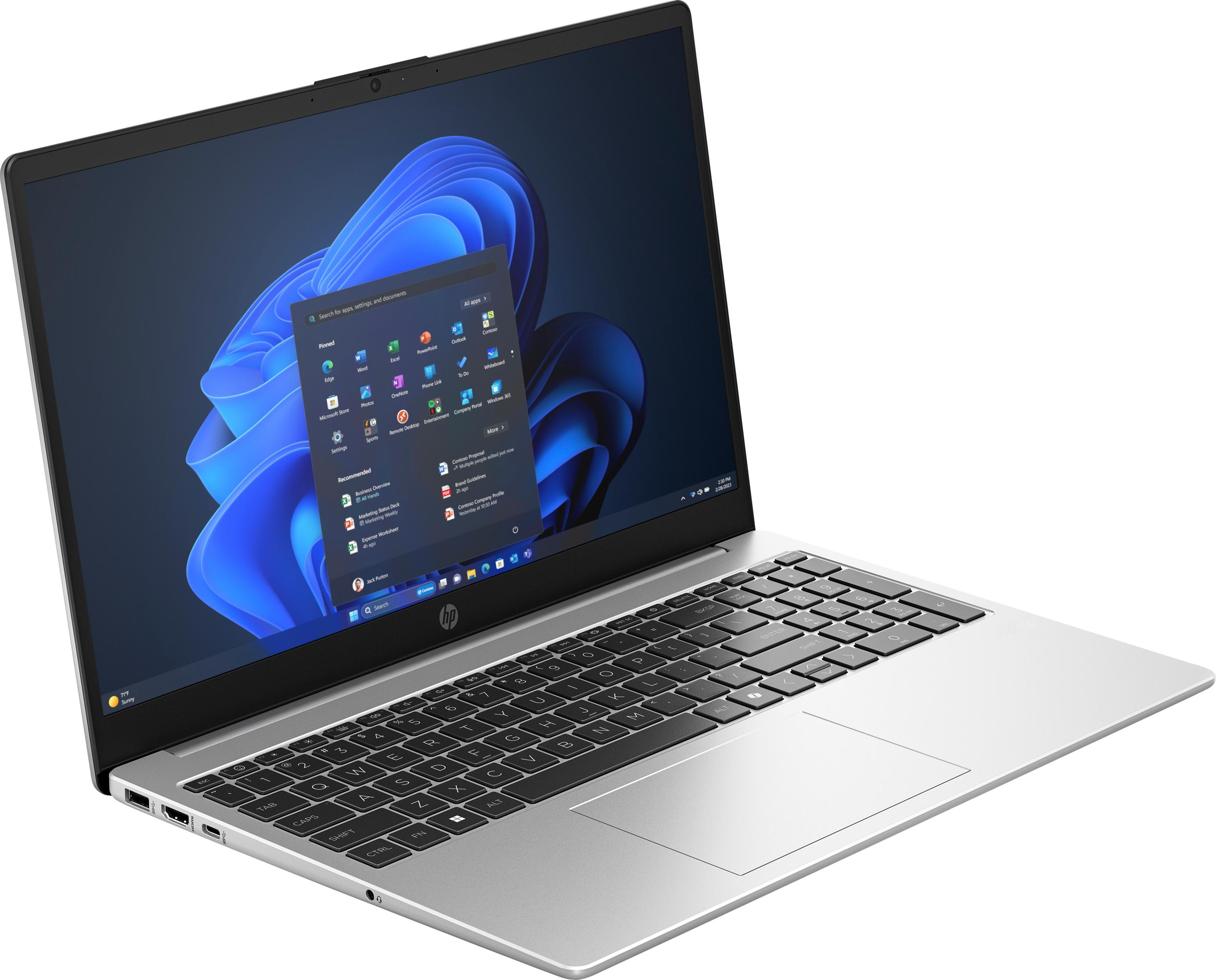 Srebrny laptop z otwartym ekranem, wyświetlający system Windows 11.