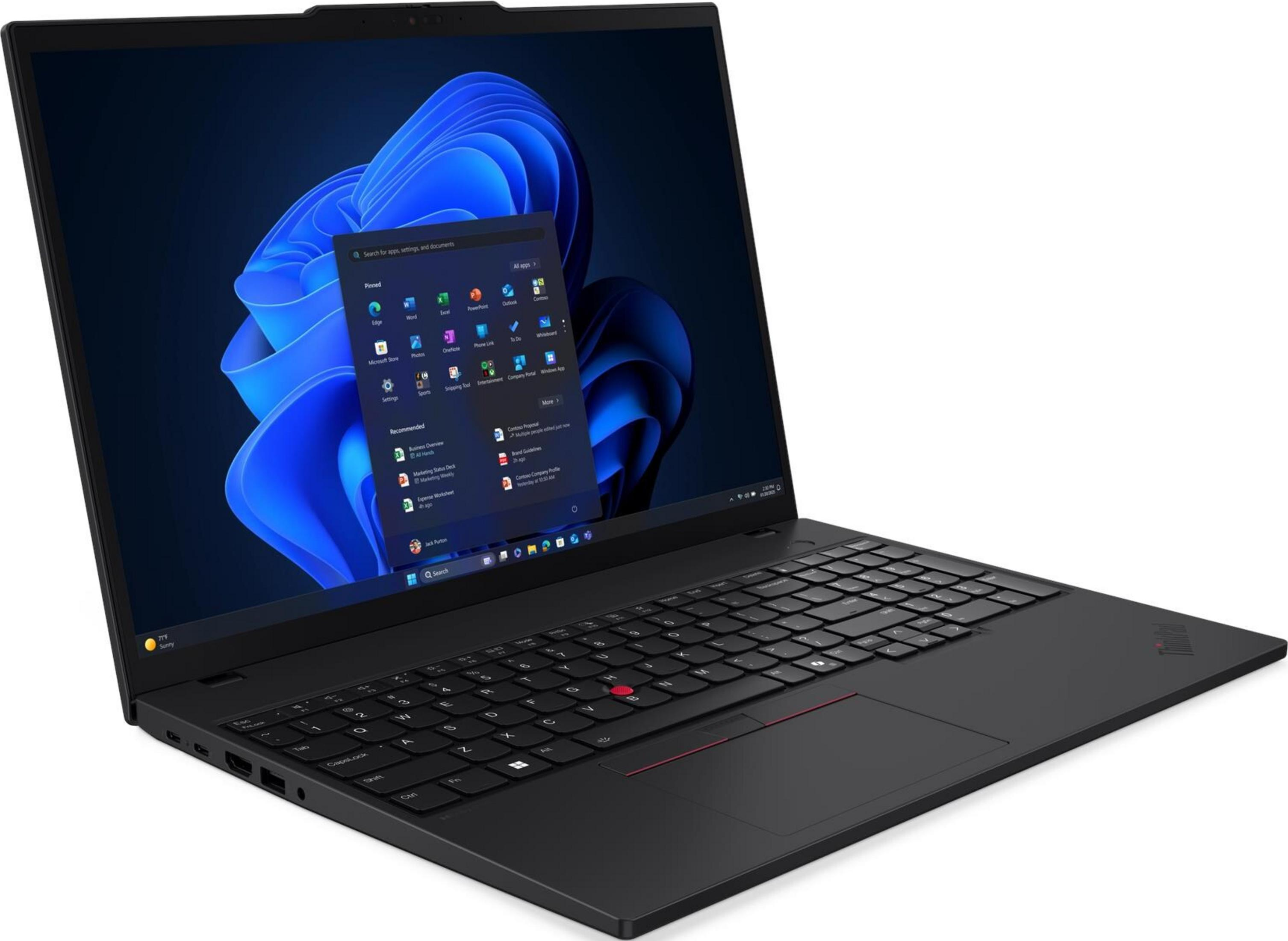 Czarny laptop z menu startowym Windows 11 i klawiaturą.