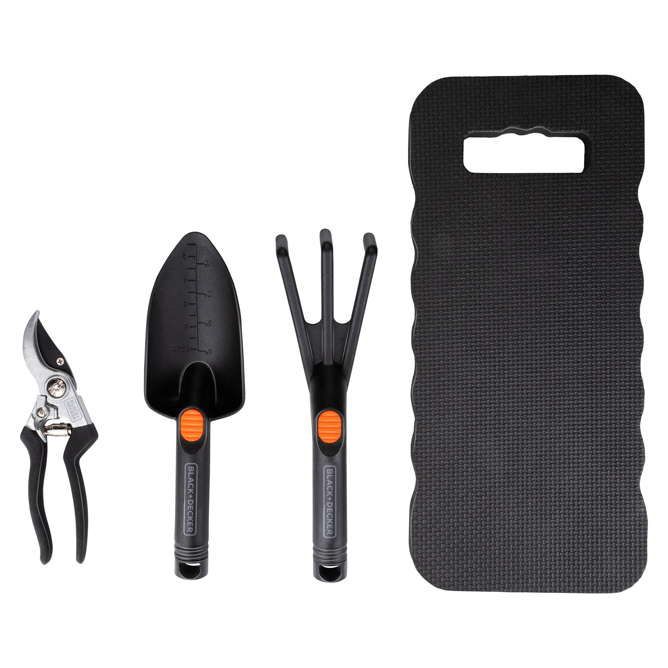 Outils de jardinage: sécateur, transplantoir, cultivateur et tapis de genoux.