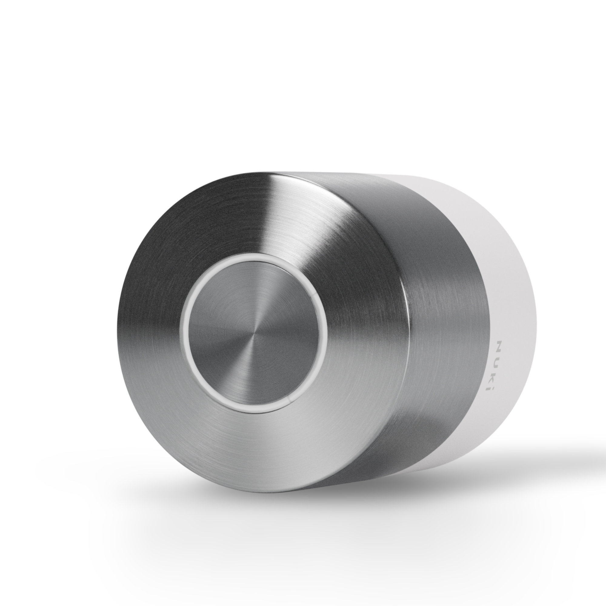 A silver cylindrical object with a brushed metal surface and a white edge.