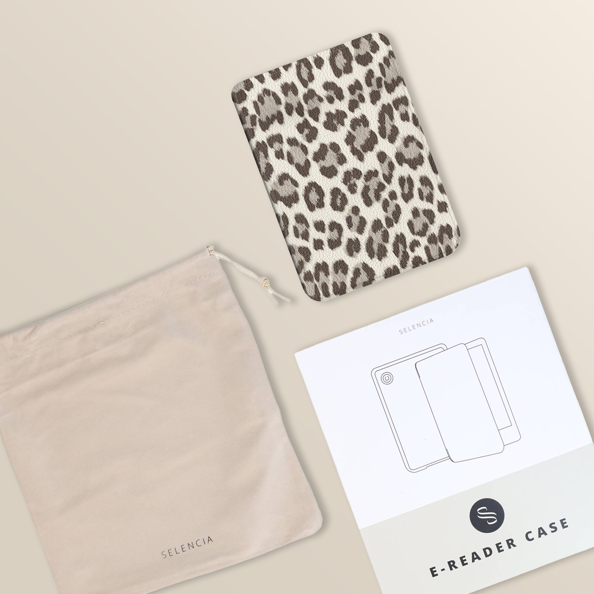 A leopard print e-reader case, a beige pouch, and an instruction manual.