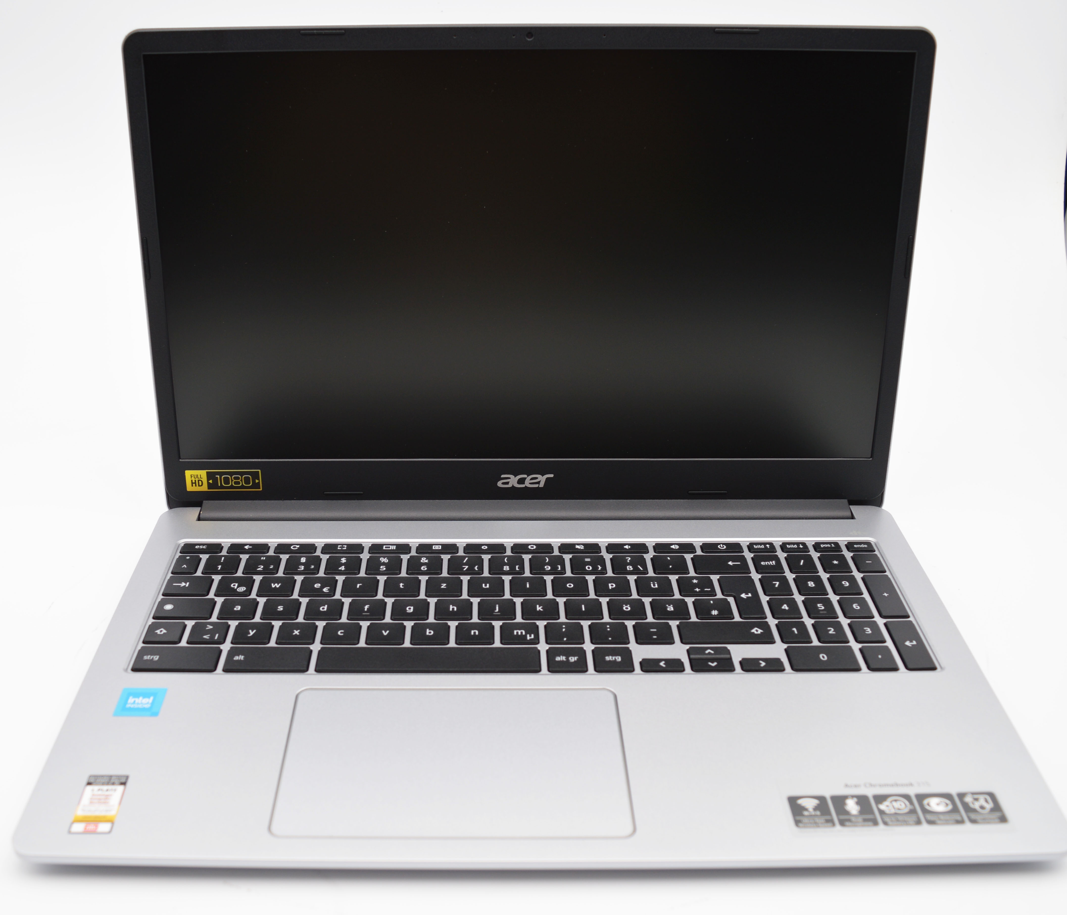 Ein silberner Acer Laptop mit schwarzer Tastatur und leerem Bildschirm.