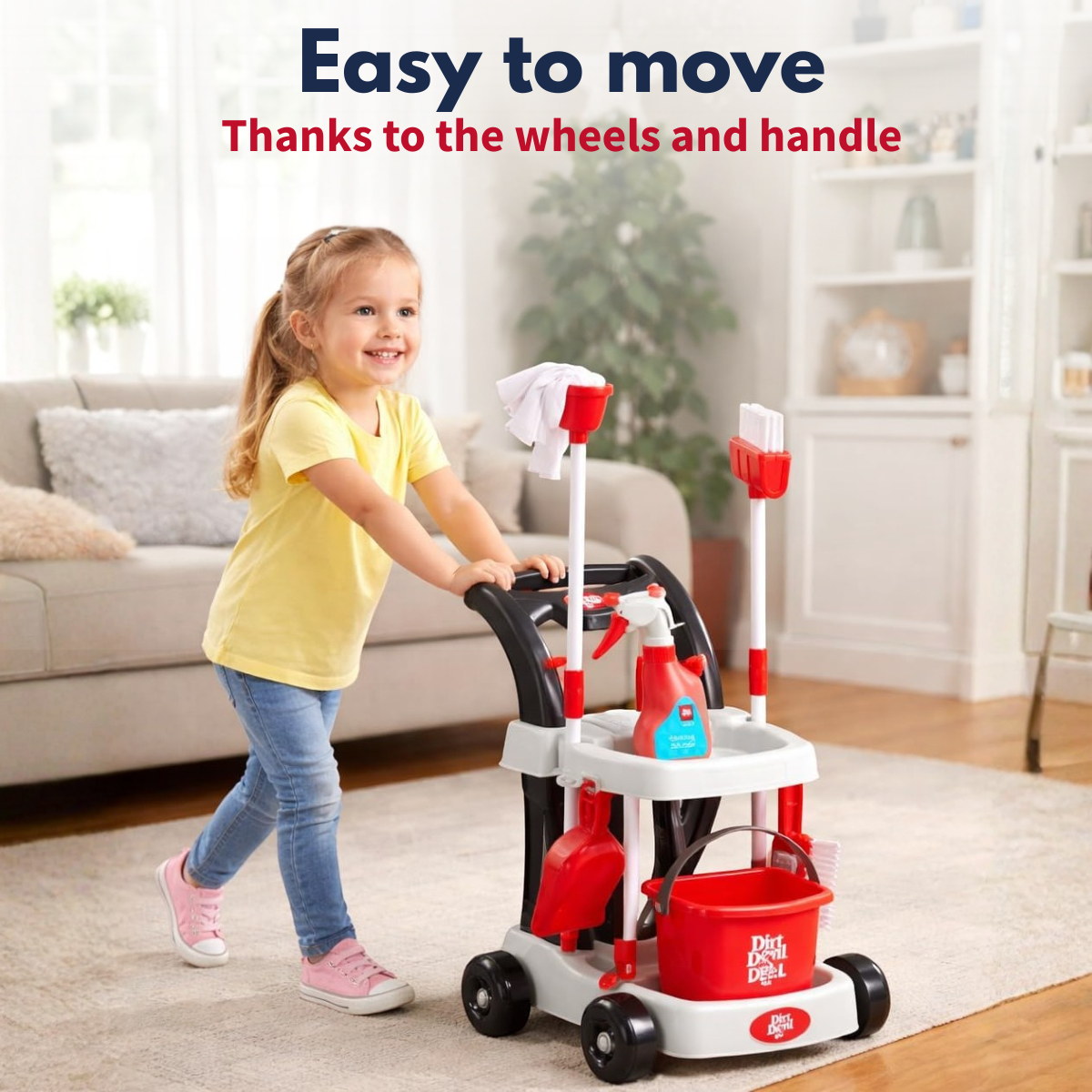 A young girl pushes a toy cleaning cart with a broom, bucket, and spray bottle.