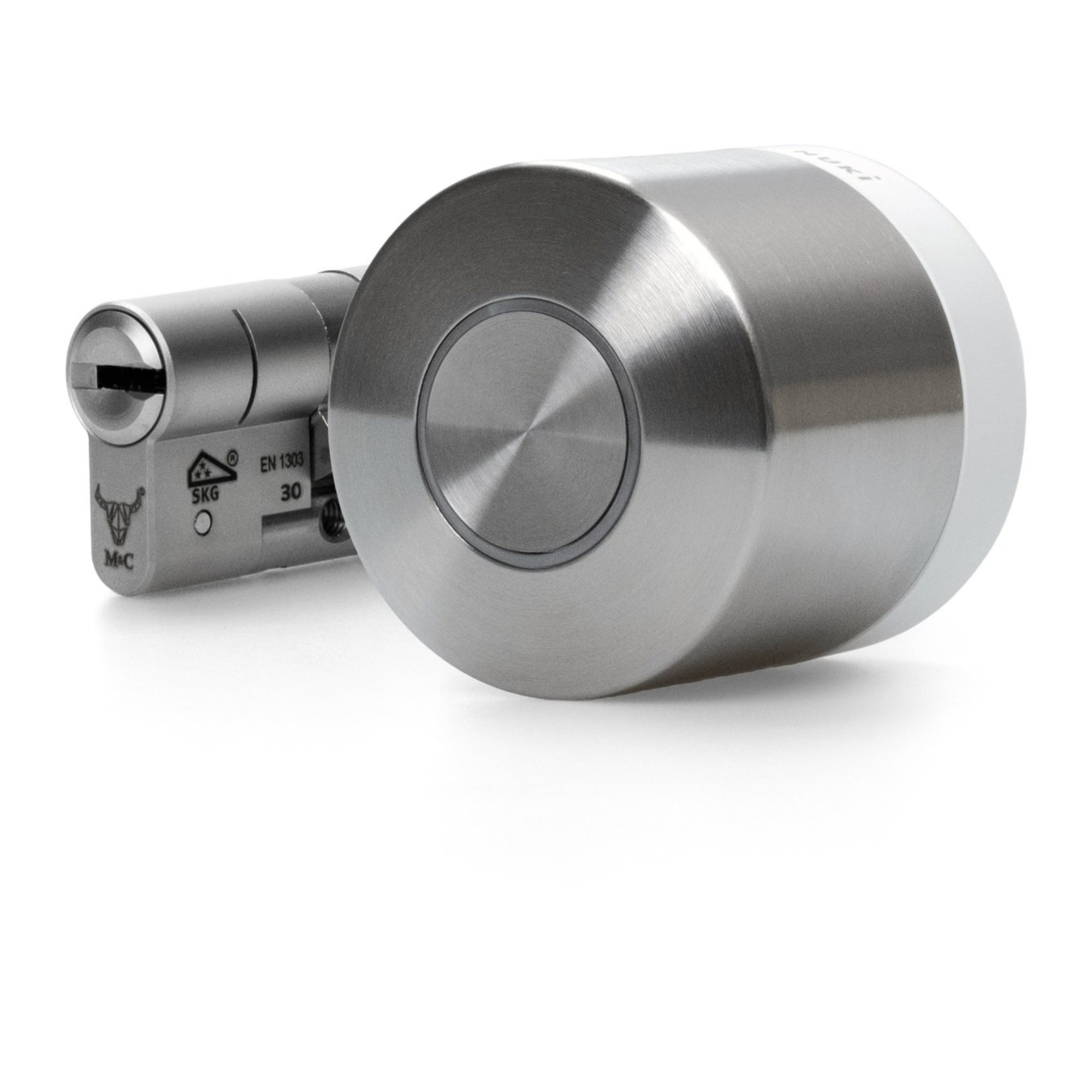A silver door cylinder with a keyhole entrance and a round attachment.