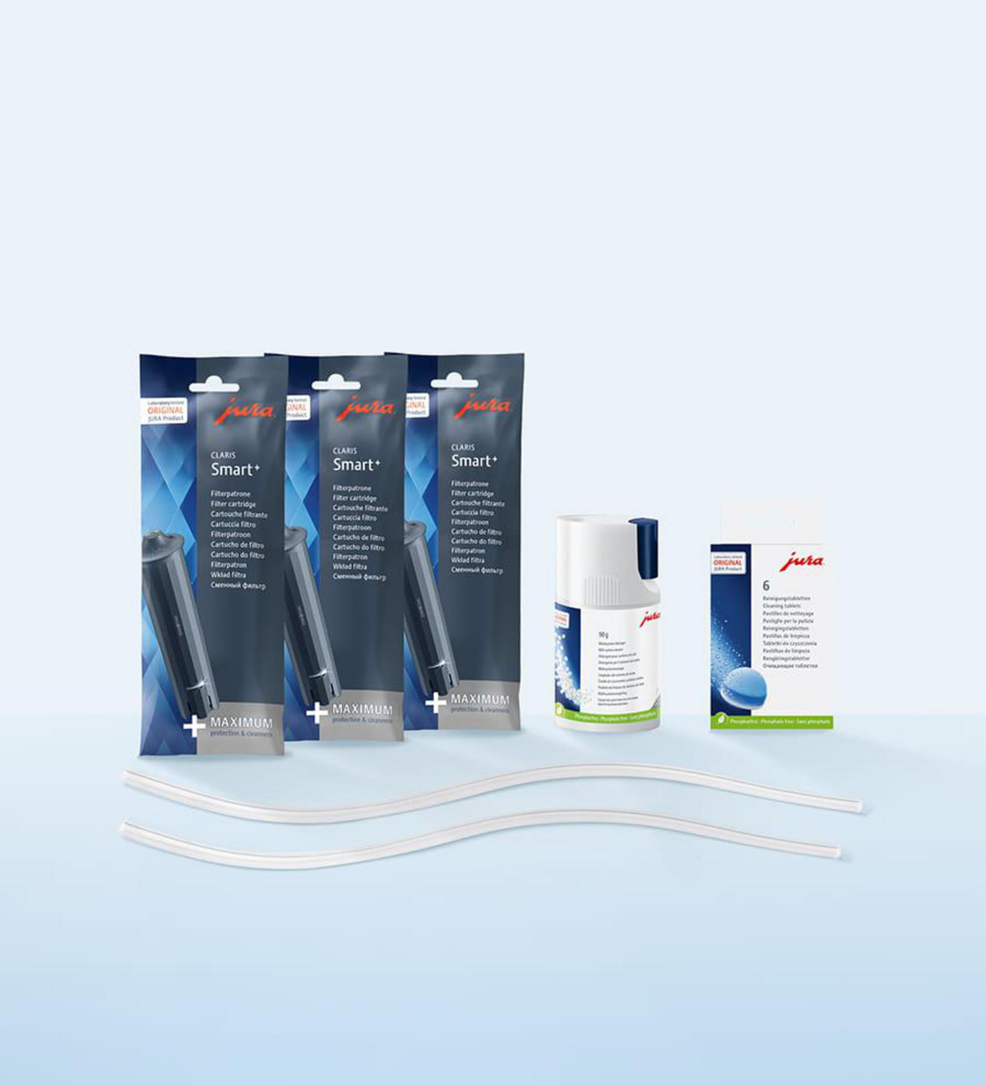 Tre cartucce filtro Jura Claris Smart+, pastiglie per la pulizia e tubi.