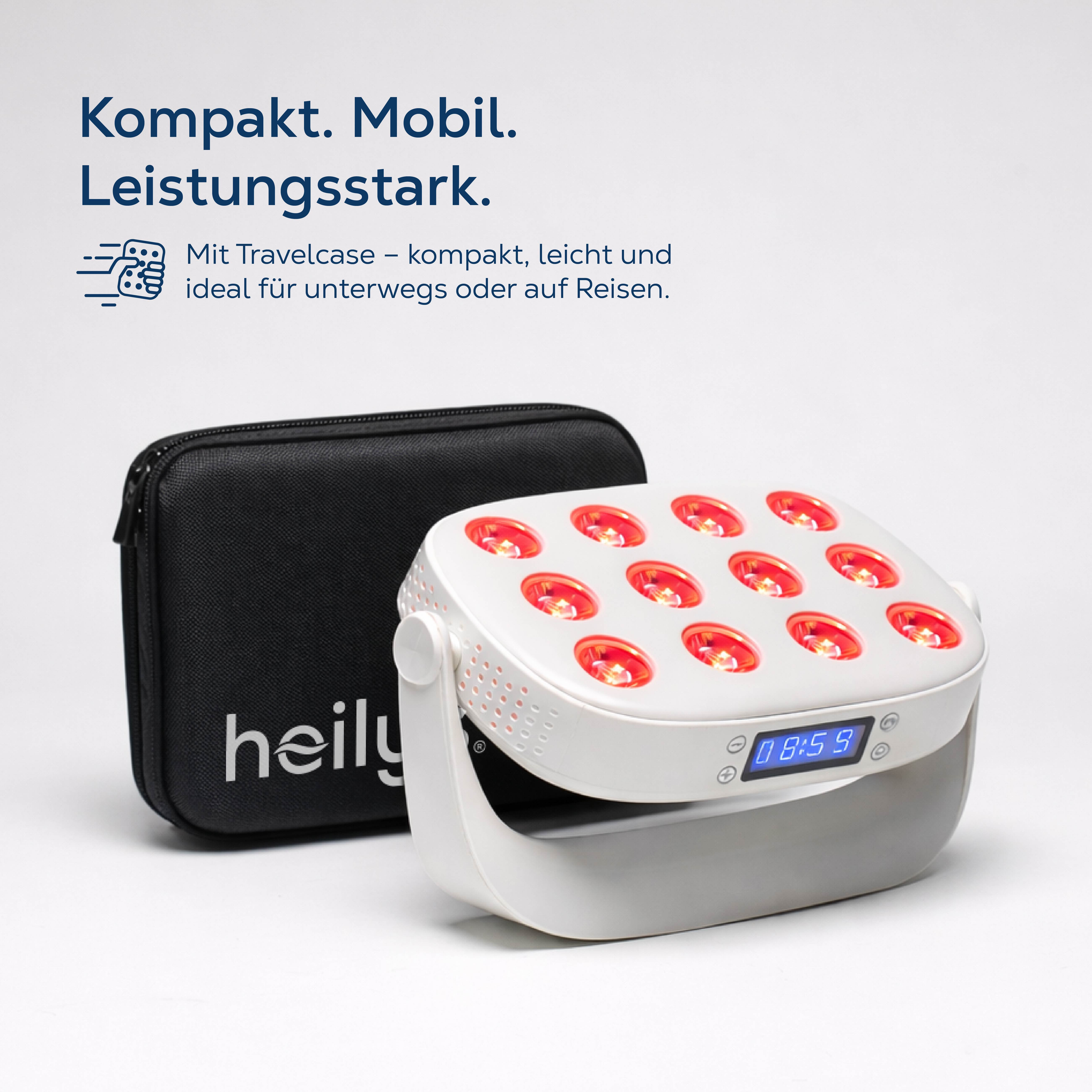 Ein weißes Heizkissen mit roten LEDs und schwarzer Tasche daneben.