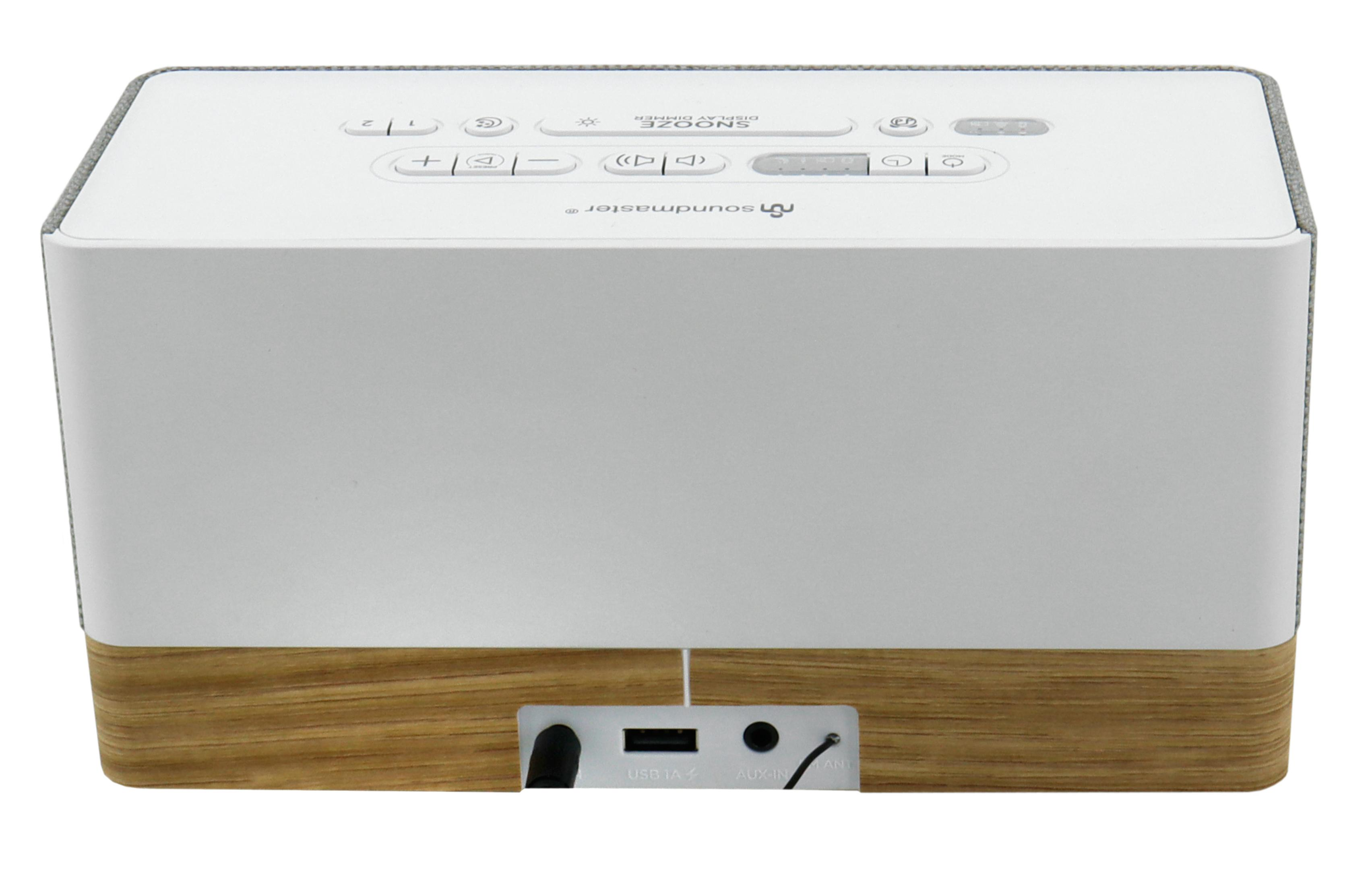 Ein weißer Wecker mit Holzakzent unten, USB- und AUX-Anschlüssen.