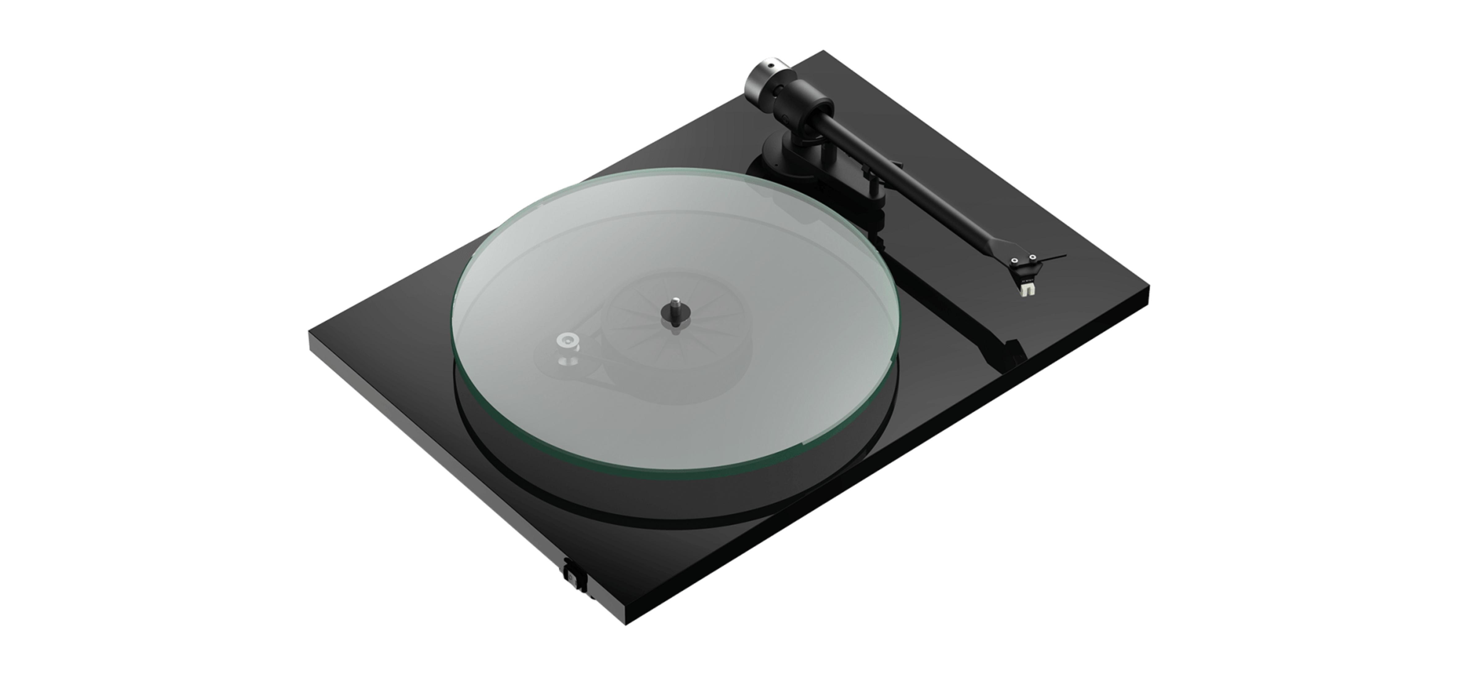 A black turntable with a clear glass platter and tonearm on a white background.