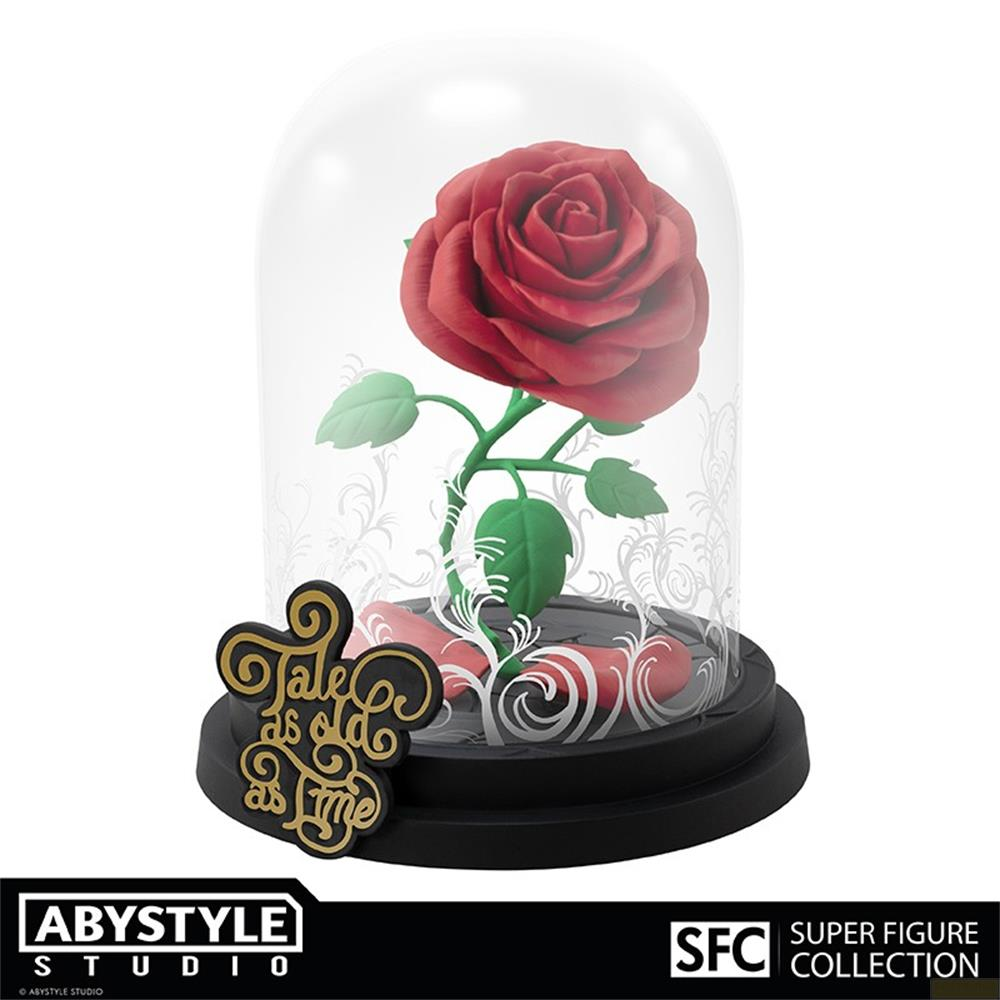 Eine rote Rose unter einer Glasglocke mit der Aufschrift „Tale as old as time“.