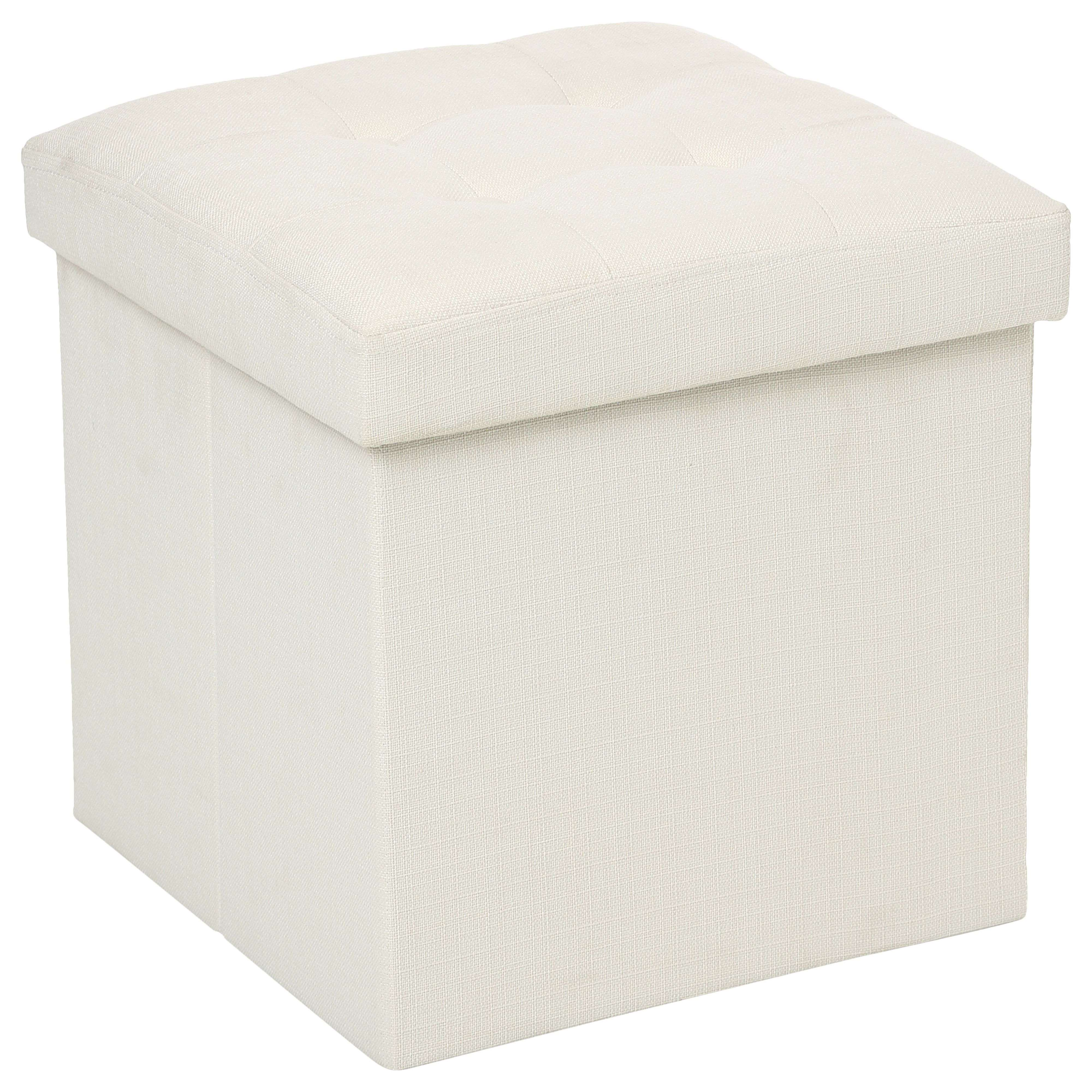 Un otomano beige con tapa acolchada y capitoné.