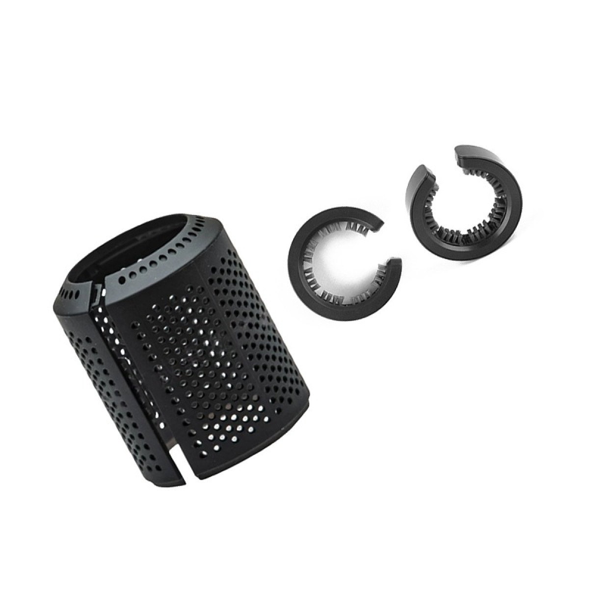 Cilindro nero forato e due anelli con denti.