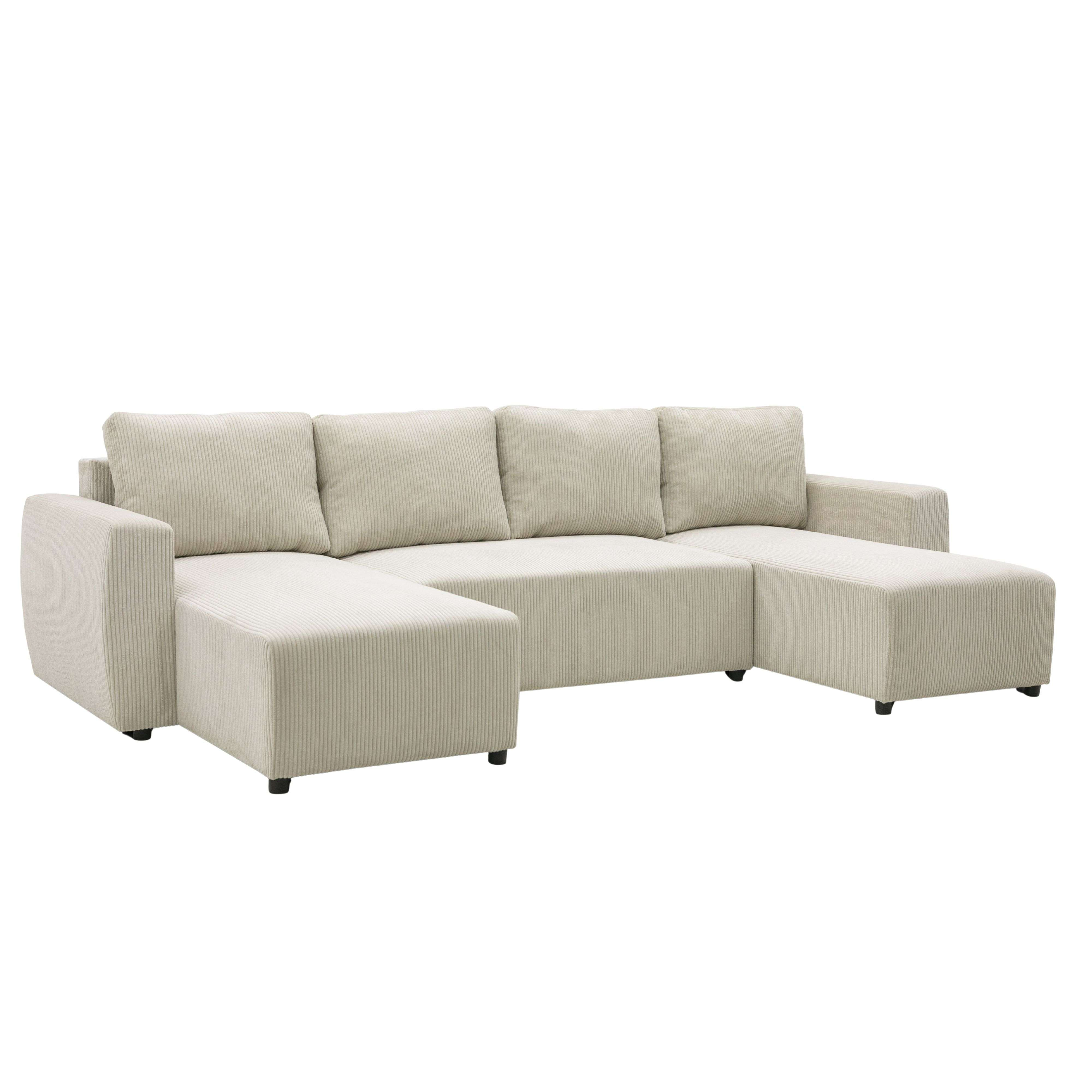 Un sofá seccional de pana beige con otomanas y cojines.